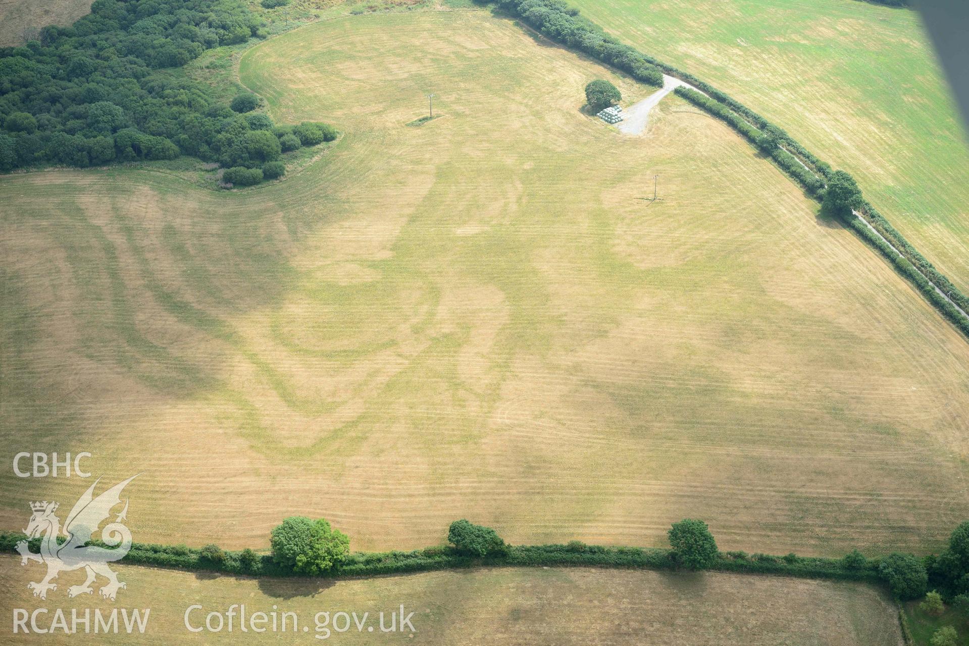 Aerial photography of Island gate farm defended enclosure Aerial reconnaissance survey for the CHERISH Project. Crown Copyright: CHERISH PROJECT 2018. Produced with EU funds through the Ireland Wales Co-operation Programme 2014-2020. All material made freely available through the Open Government Licence.