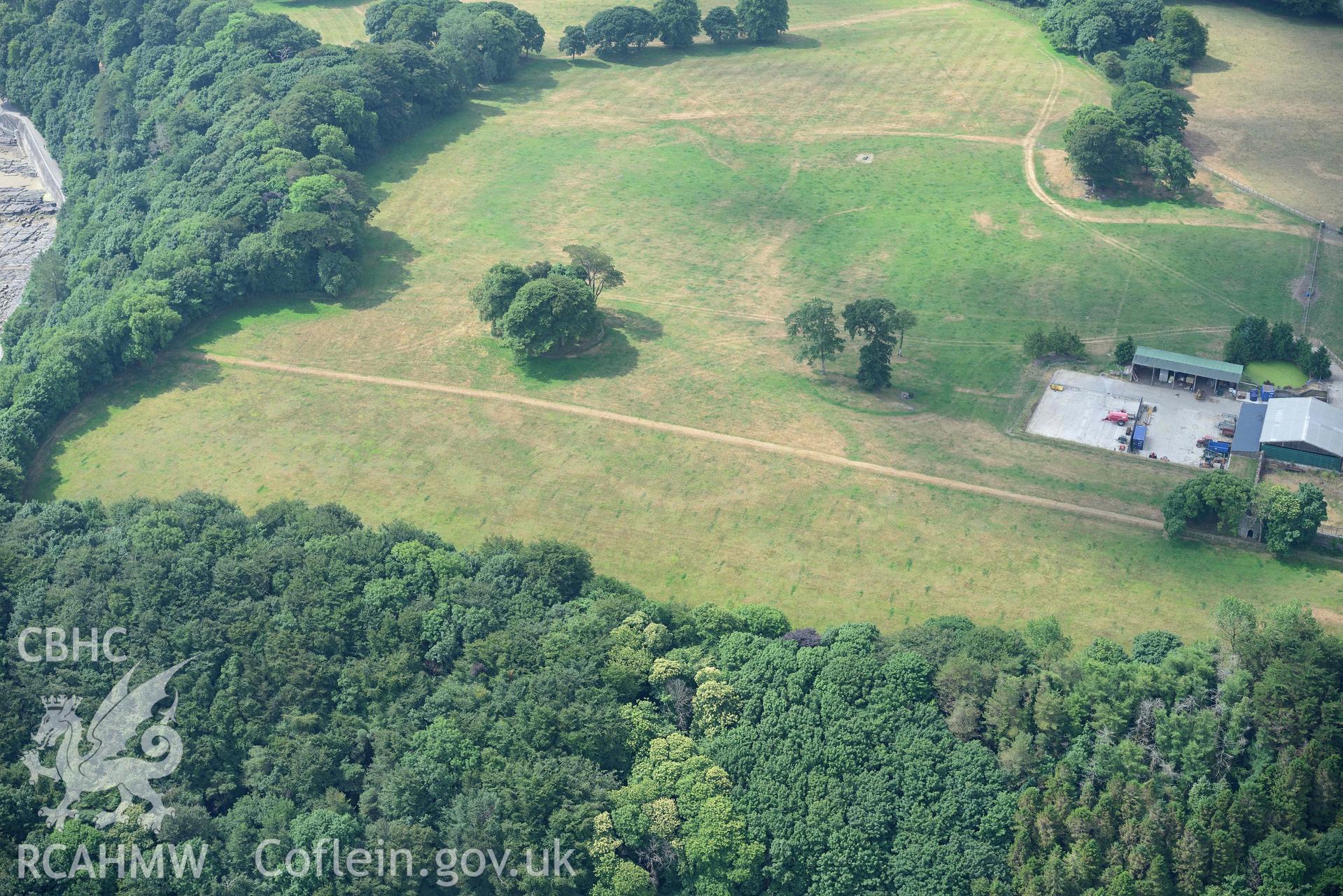 Aerial photography of Hean Castle defended enclosure Aerial reconnaissance survey for the CHERISH Project. Crown Copyright: CHERISH PROJECT 2018. Produced with EU funds through the Ireland Wales Co-operation Programme 2014-2020. All material made freely available through the Open Government Licence.