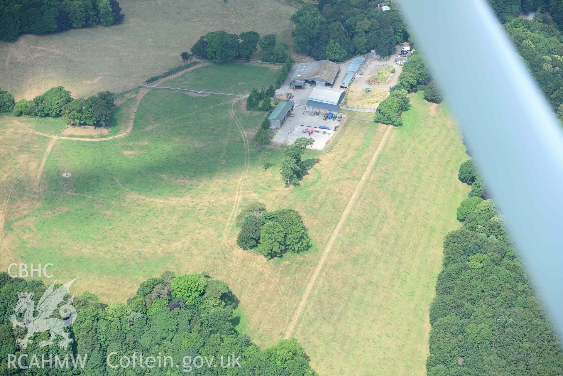 Aerial photography of Hean Castle defended enclosure Aerial reconnaissance survey for the CHERISH Project. Crown Copyright: CHERISH PROJECT 2018. Produced with EU funds through the Ireland Wales Co-operation Programme 2014-2020. All material made freely available through the Open Government Licence.