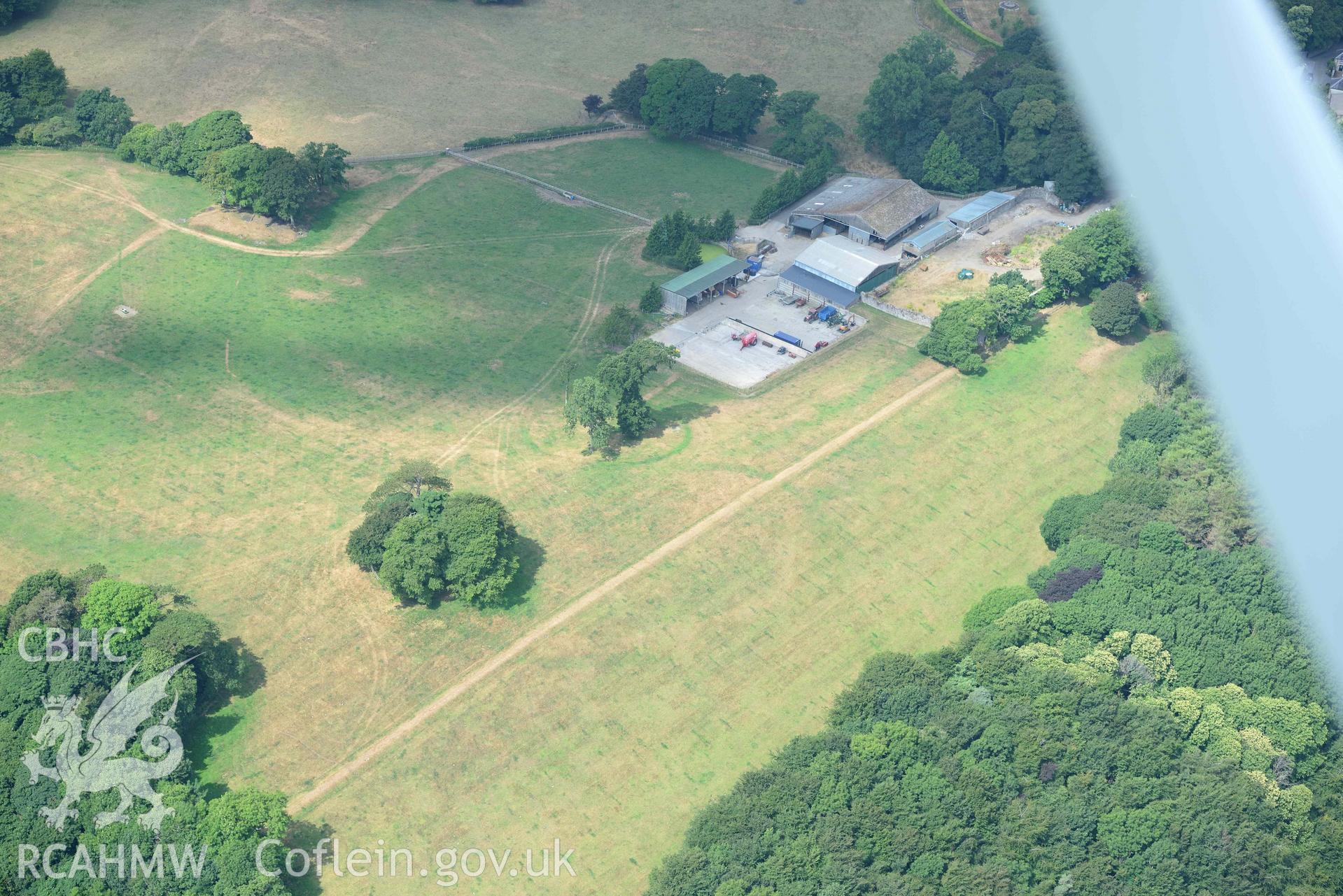 Aerial photography of Hean Castle defended enclosure Aerial reconnaissance survey for the CHERISH Project. Crown Copyright: CHERISH PROJECT 2018. Produced with EU funds through the Ireland Wales Co-operation Programme 2014-2020. All material made freely available through the Open Government Licence.