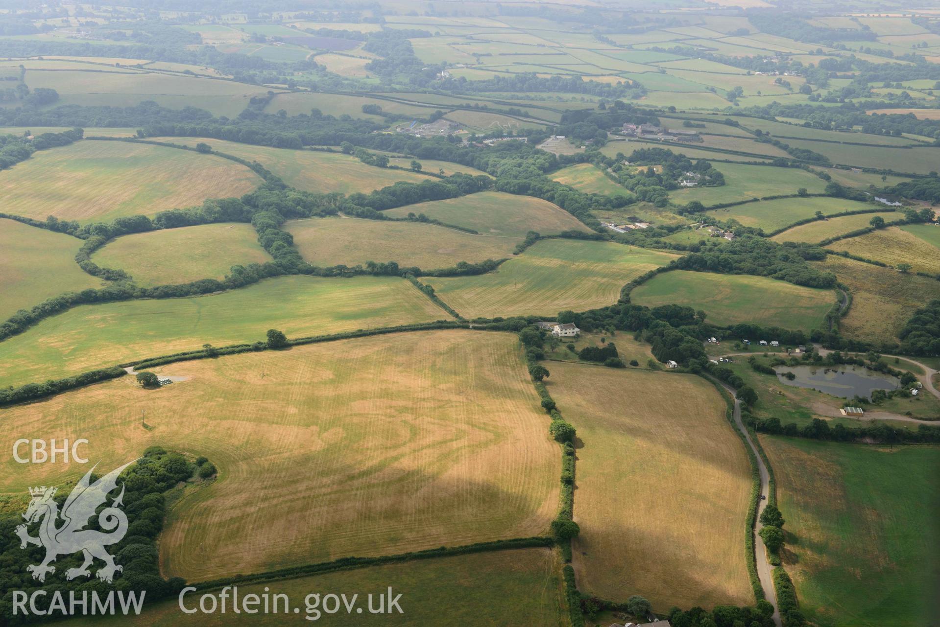 Aerial photography of Island gate farm defended enclosure Aerial reconnaissance survey for the CHERISH Project. Crown Copyright: CHERISH PROJECT 2018. Produced with EU funds through the Ireland Wales Co-operation Programme 2014-2020. All material made freely available through the Open Government Licence.