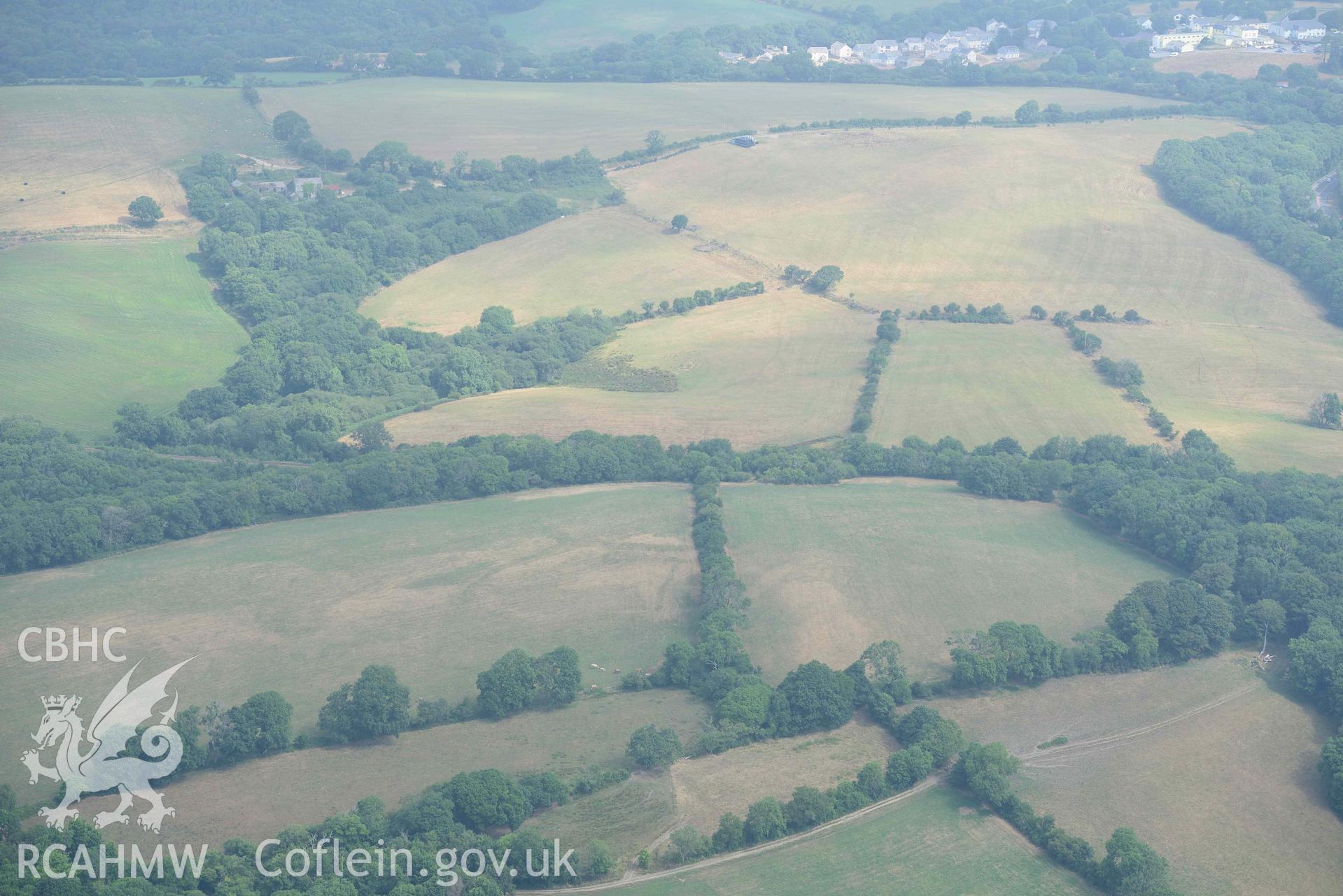 Aerial photography of Castle hill doubled defended enclosure Aerial reconnaissance survey for the CHERISH Project. Crown Copyright: CHERISH PROJECT 2018. Produced with EU funds through the Ireland Wales Co-operation Programme 2014-2020. All material made freely available through the Open Government Licence.