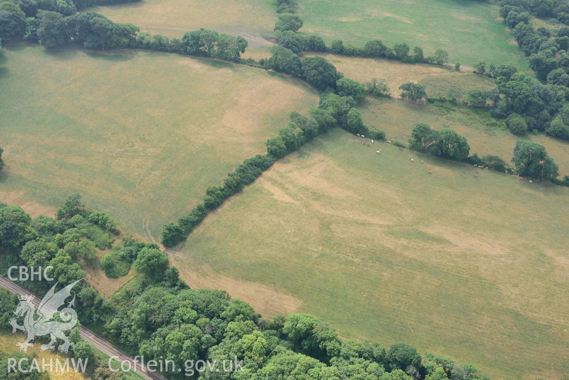 Aerial photography of Castle hill doubled defended enclosure Aerial reconnaissance survey for the CHERISH Project. Crown Copyright: CHERISH PROJECT 2018. Produced with EU funds through the Ireland Wales Co-operation Programme 2014-2020. All material made freely available through the Open Government Licence.