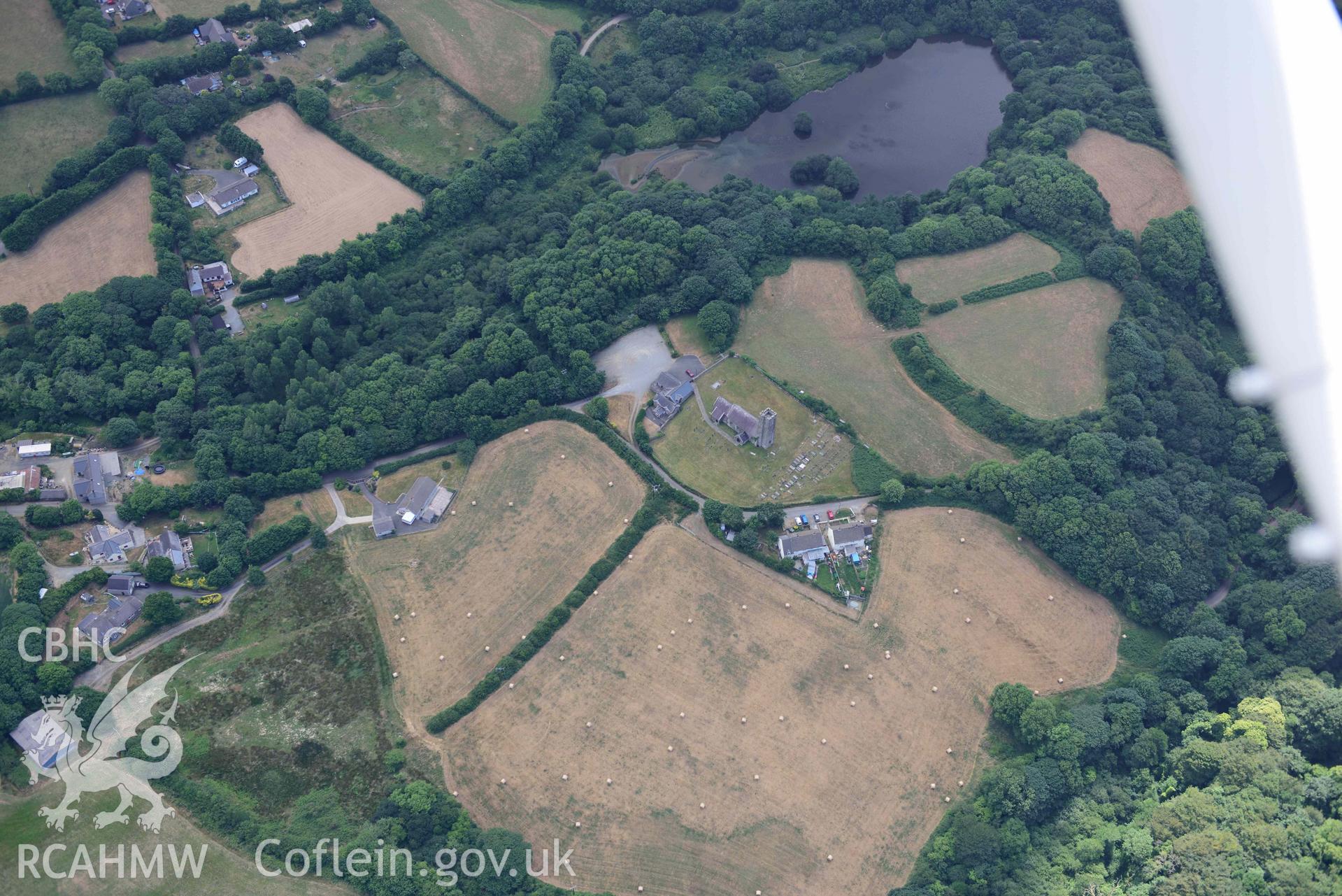 Aerial photography of Walwyns castle and St James church Aerial reconnaissance survey for the CHERISH Project. Crown Copyright: CHERISH PROJECT 2018. Produced with EU funds through the Ireland Wales Co-operation Programme 2014-2020. All material made freely available through the Open Government Licence.