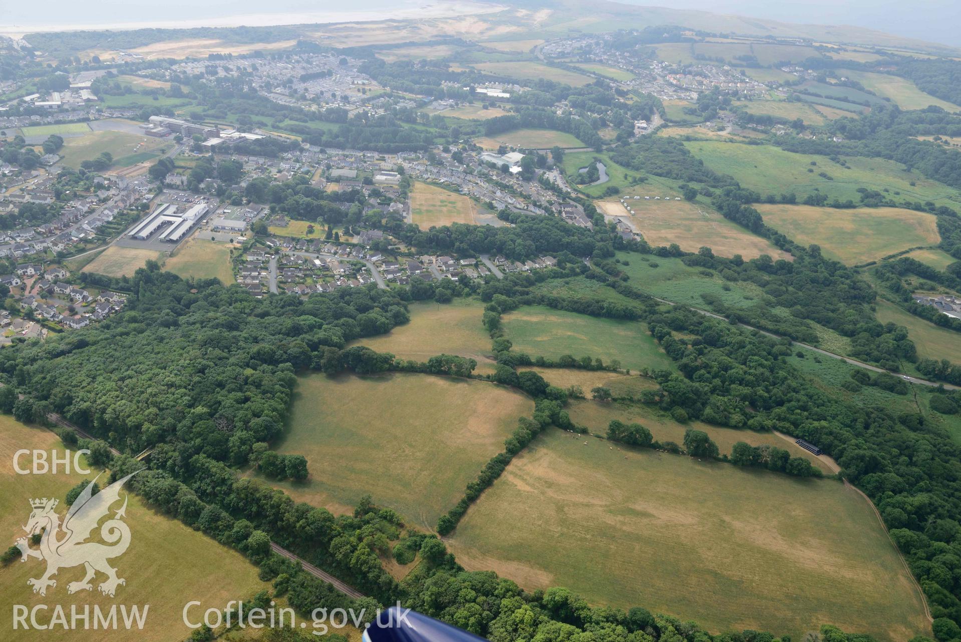 Aerial photography of Castle hill doubled defended enclosure Aerial reconnaissance survey for the CHERISH Project. Crown Copyright: CHERISH PROJECT 2018. Produced with EU funds through the Ireland Wales Co-operation Programme 2014-2020. All material made freely available through the Open Government Licence.