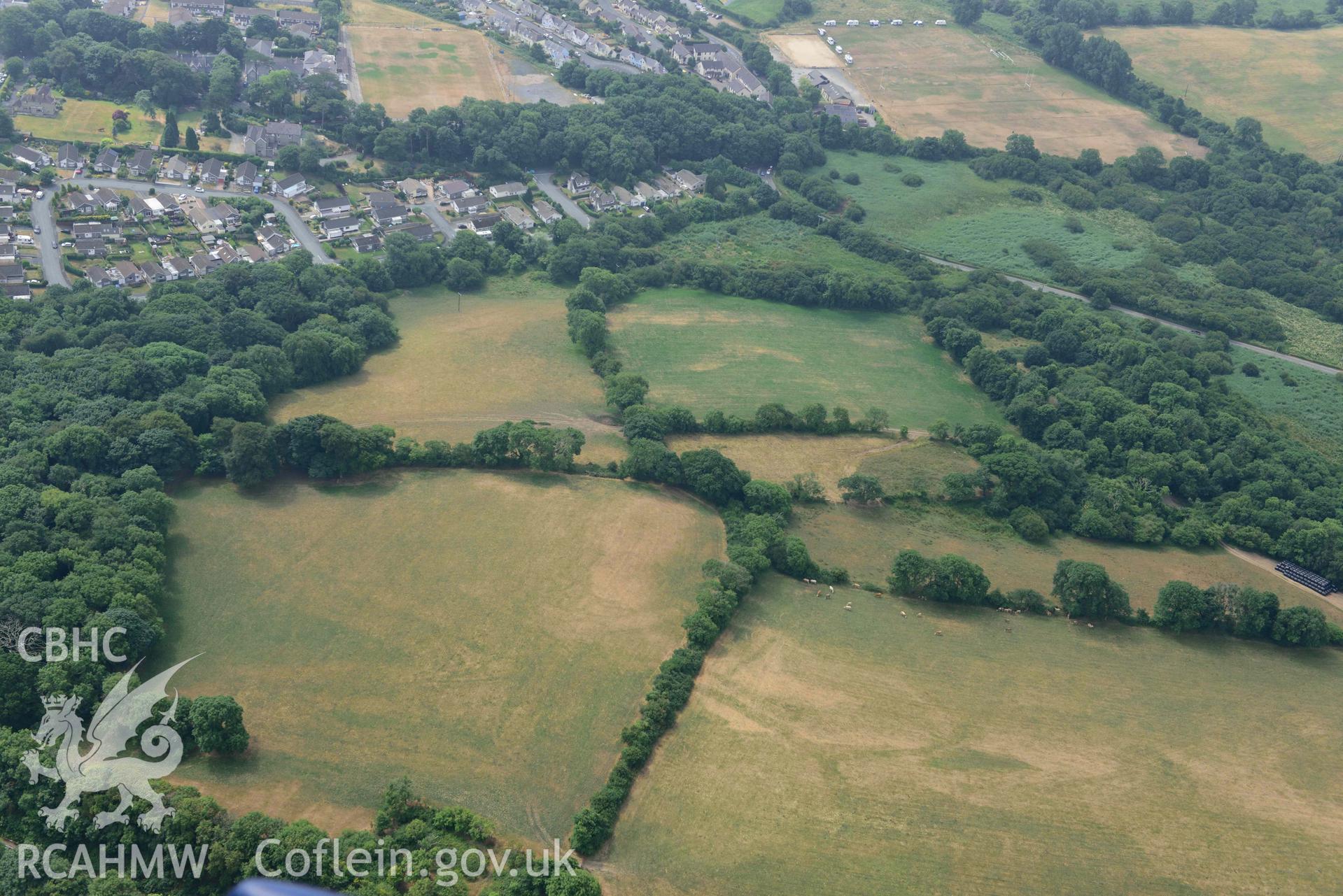 Aerial photography of Castle hill doubled defended enclosure Aerial reconnaissance survey for the CHERISH Project. Crown Copyright: CHERISH PROJECT 2018. Produced with EU funds through the Ireland Wales Co-operation Programme 2014-2020. All material made freely available through the Open Government Licence.