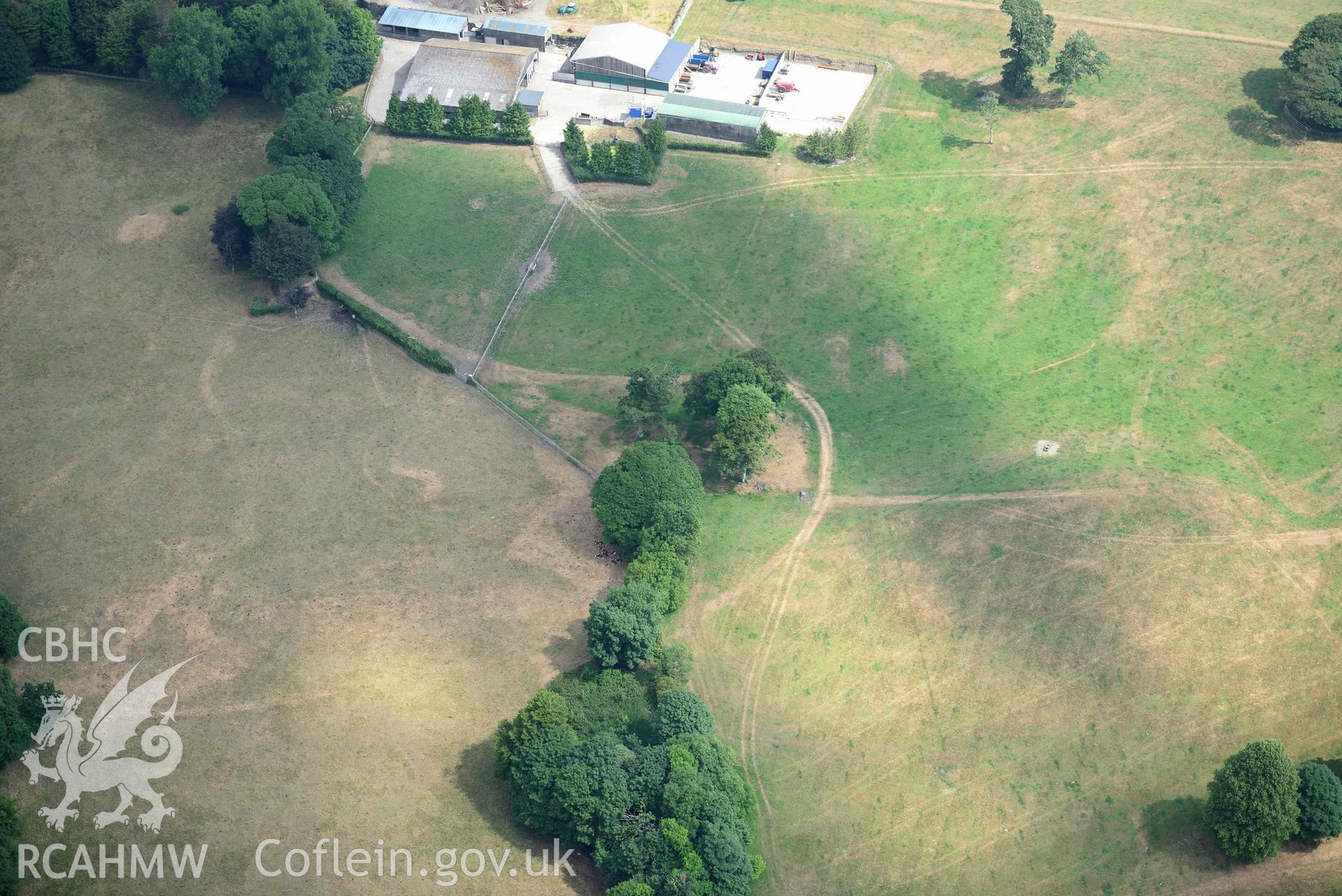 Aerial photography of Hean Castle defended enclosure Aerial reconnaissance survey for the CHERISH Project. Crown Copyright: CHERISH PROJECT 2018. Produced with EU funds through the Ireland Wales Co-operation Programme 2014-2020. All material made freely available through the Open Government Licence.