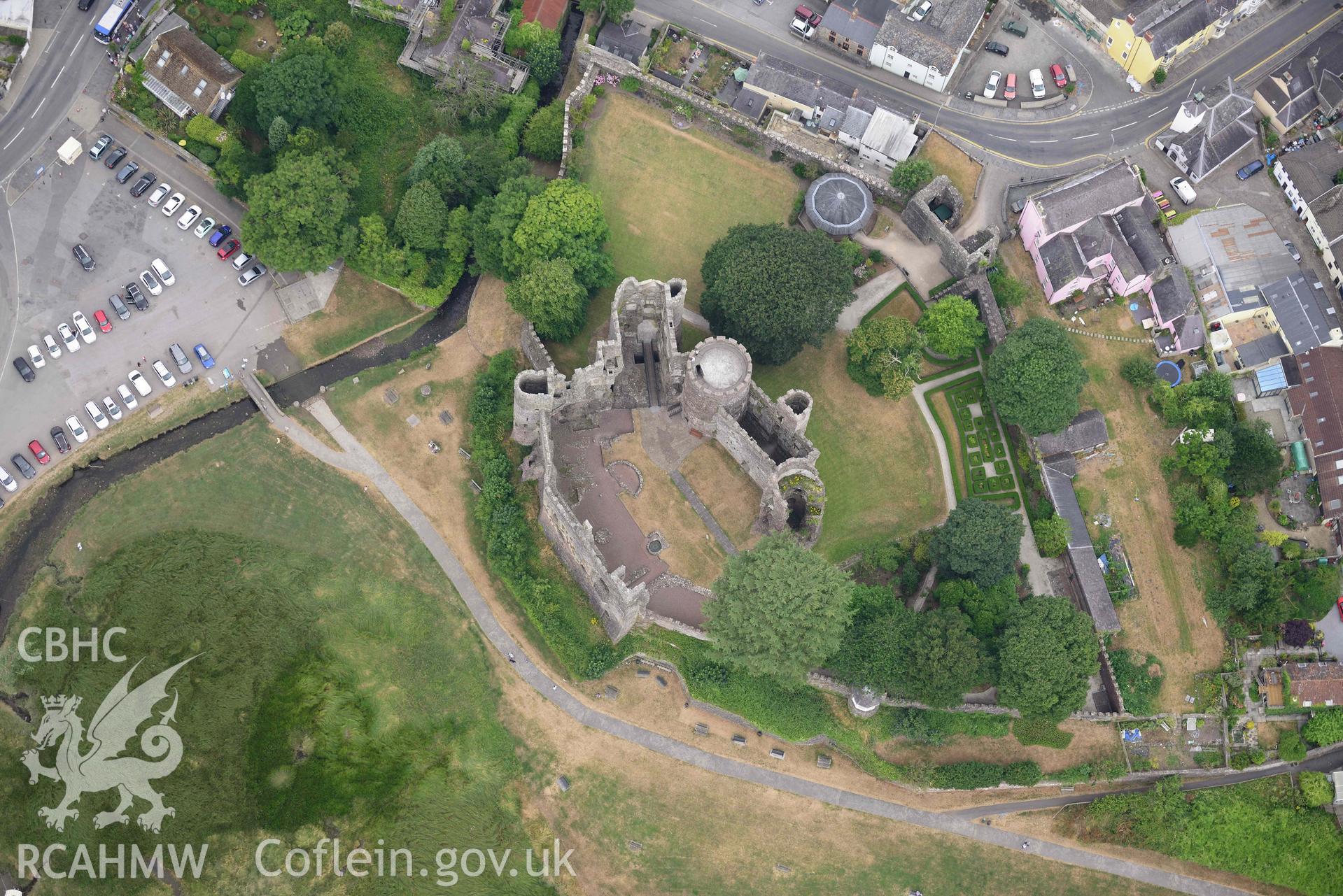 Aerial photography of Laugharne castle and harbour Aerial reconnaissance survey for the CHERISH Project. Crown Copyright: CHERISH PROJECT 2018. Produced with EU funds through the Ireland Wales Co-operation Programme 2014-2020. All material made freely available through the Open Government Licence.