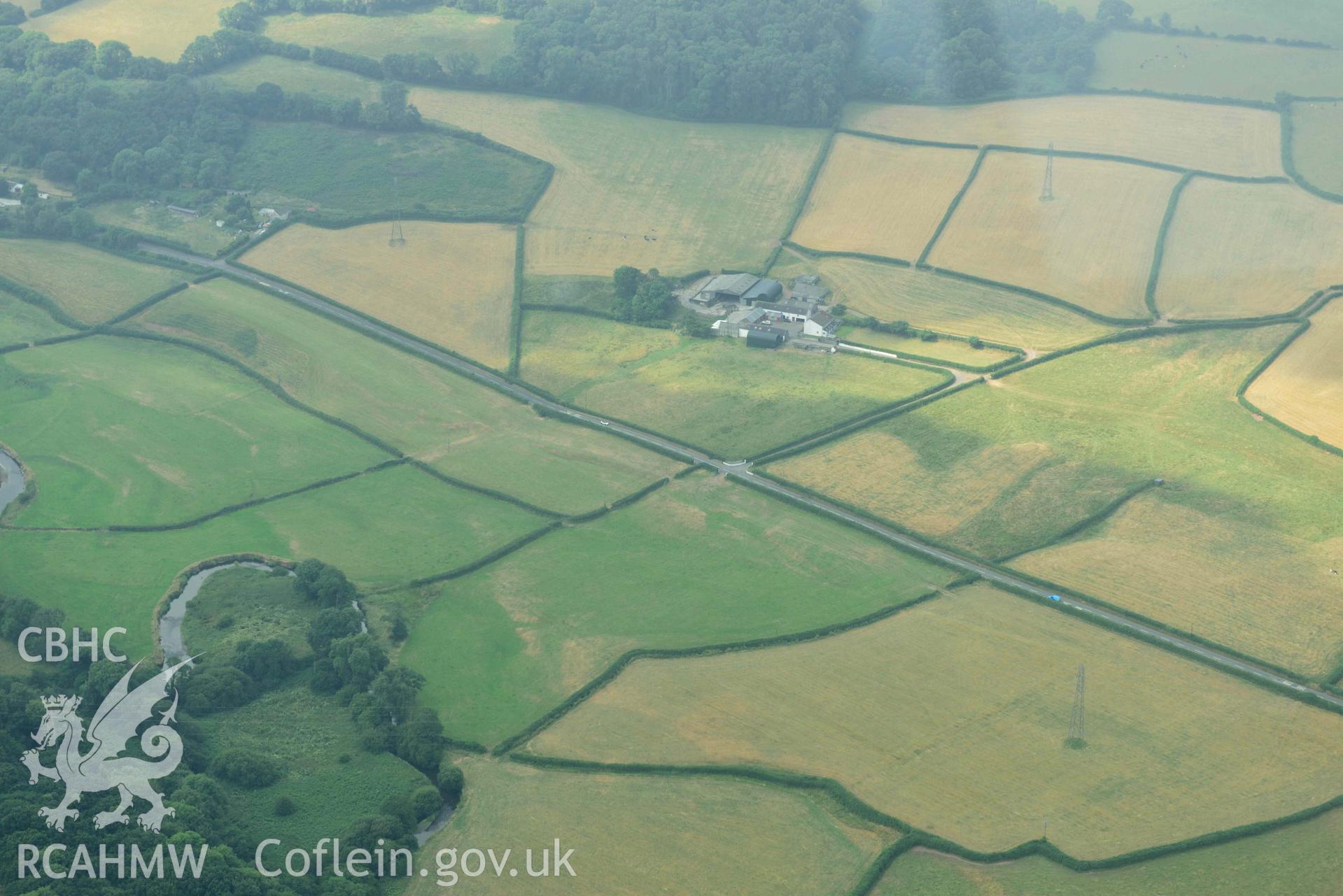 Aerial photography of Roman Road, 60 Carmarthan to Kidwelly at Pontmorlais cottage Aerial reconnaissance survey for the CHERISH Project. Crown Copyright: CHERISH PROJECT 2018. Produced with EU funds through the Ireland Wales Co-operation Programme 2014-2020. All material made freely available through the Open Government Licence.