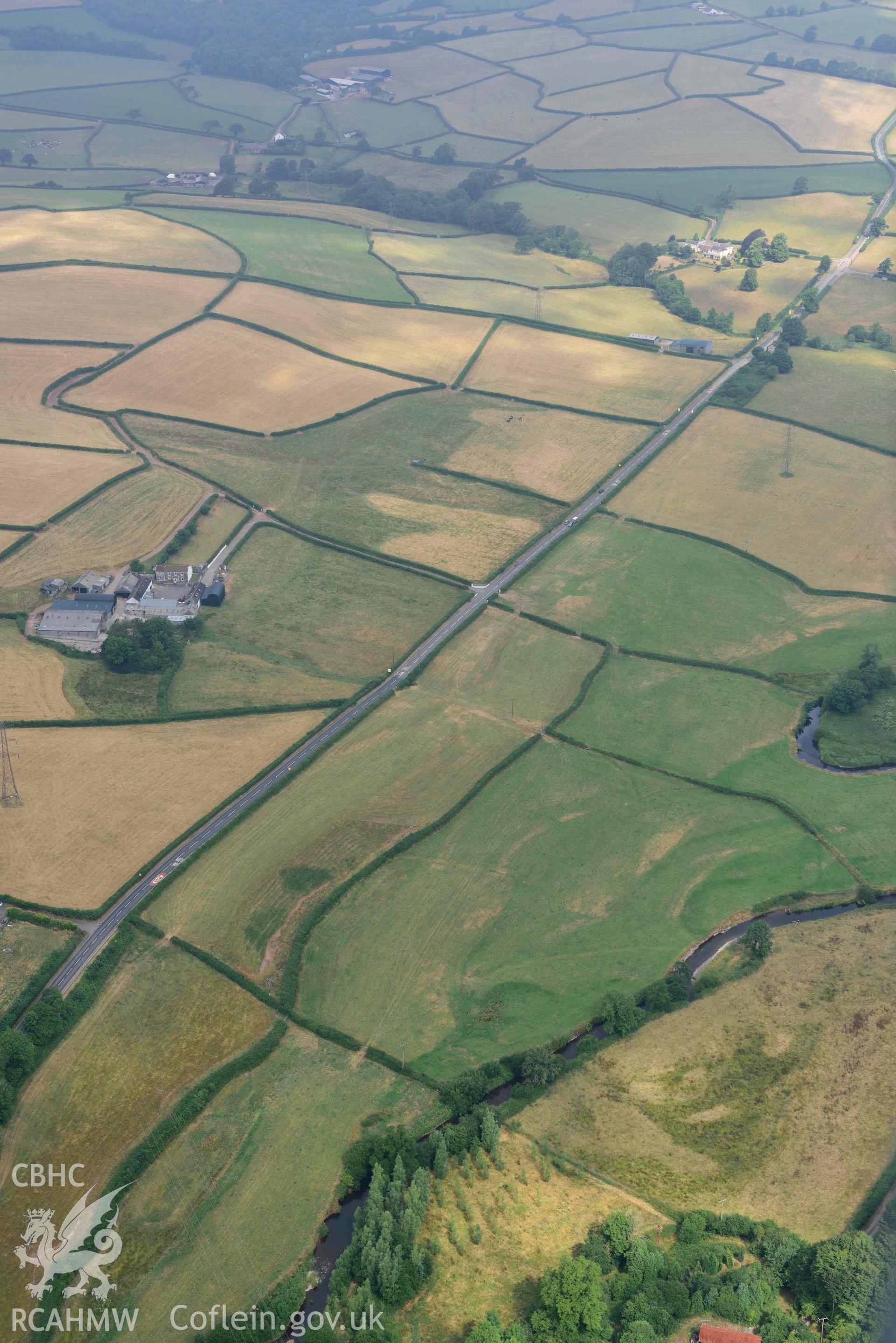 Aerial photography of Roman Road, 60 Carmarthan to Kidwelly at Pontmorlais cottage Aerial reconnaissance survey for the CHERISH Project. Crown Copyright: CHERISH PROJECT 2018. Produced with EU funds through the Ireland Wales Co-operation Programme 2014-2020. All material made freely available through the Open Government Licence.