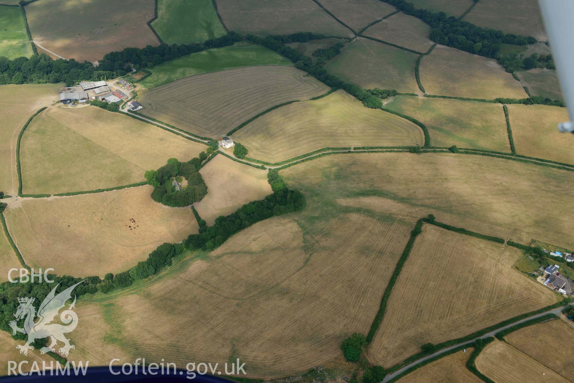 Aerial photography of Llangan Church cropmark enclosure complex Aerial reconnaissance survey for the CHERISH Project. Crown Copyright: CHERISH PROJECT 2018. Produced with EU funds through the Ireland Wales Co-operation Programme 2014-2020. All material made freely available through the Open Government Licence.