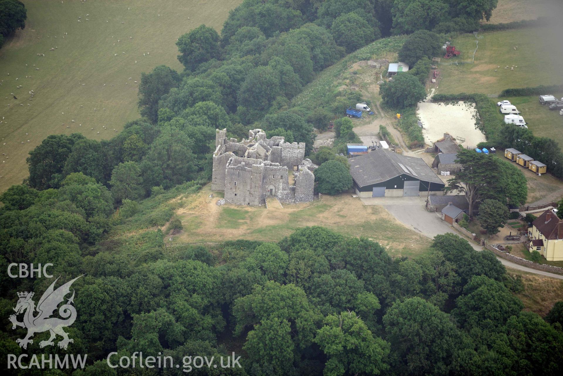 Aerial photography of Weobley Castle from the west Aerial reconnaissance survey for the CHERISH Project. Crown Copyright: CHERISH PROJECT 2018. Produced with EU funds through the Ireland Wales Co-operation Programme 2014-2020. All material made freely available through the Open Government Licence.