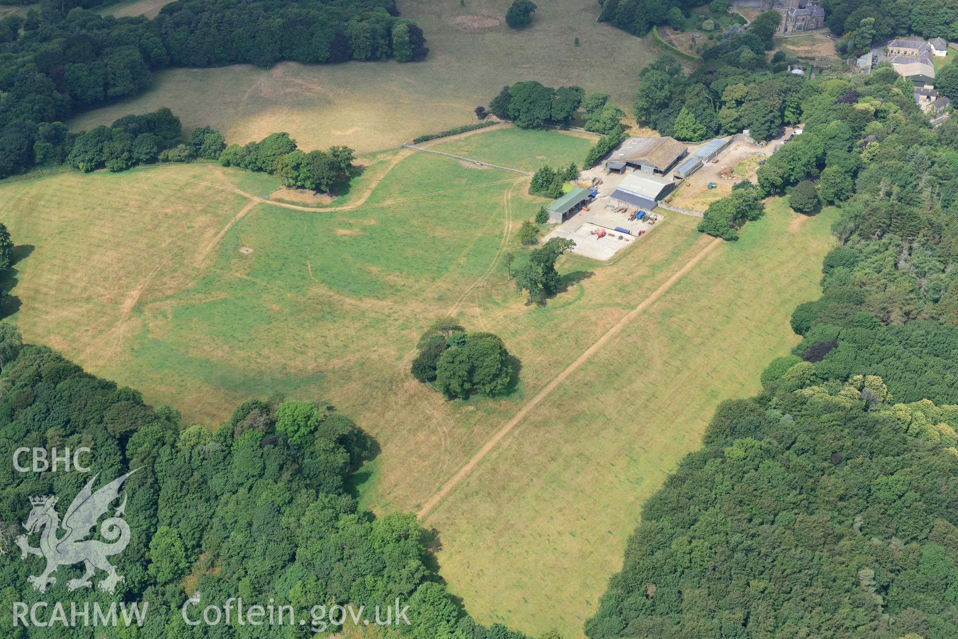 Aerial photography of Hean Castle defended enclosure Aerial reconnaissance survey for the CHERISH Project. Crown Copyright: CHERISH PROJECT 2018. Produced with EU funds through the Ireland Wales Co-operation Programme 2014-2020. All material made freely available through the Open Government Licence.