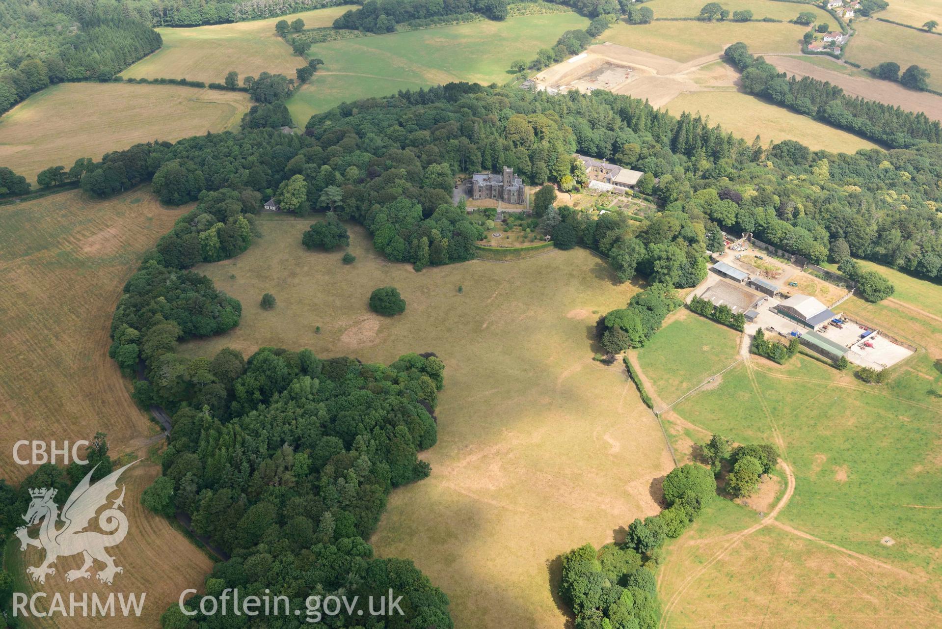 Aerial photography of  Hean Castle and garden Aerial reconnaissance survey for the CHERISH Project. Crown Copyright: CHERISH PROJECT 2018. Produced with EU funds through the Ireland Wales Co-operation Programme 2014-2020. All material made freely available through the Open Government Licence.