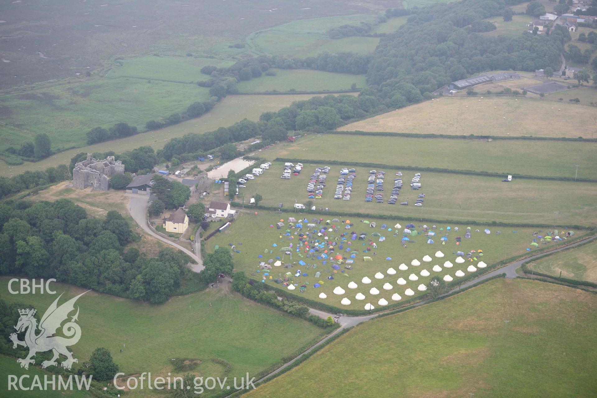 Aerial photography of Folk Camps at Weobley castle Aerial reconnaissance survey for the CHERISH Project. Crown Copyright: CHERISH PROJECT 2018. Produced with EU funds through the Ireland Wales Co-operation Programme 2014-2020. All material made freely available through the Open Government Licence.