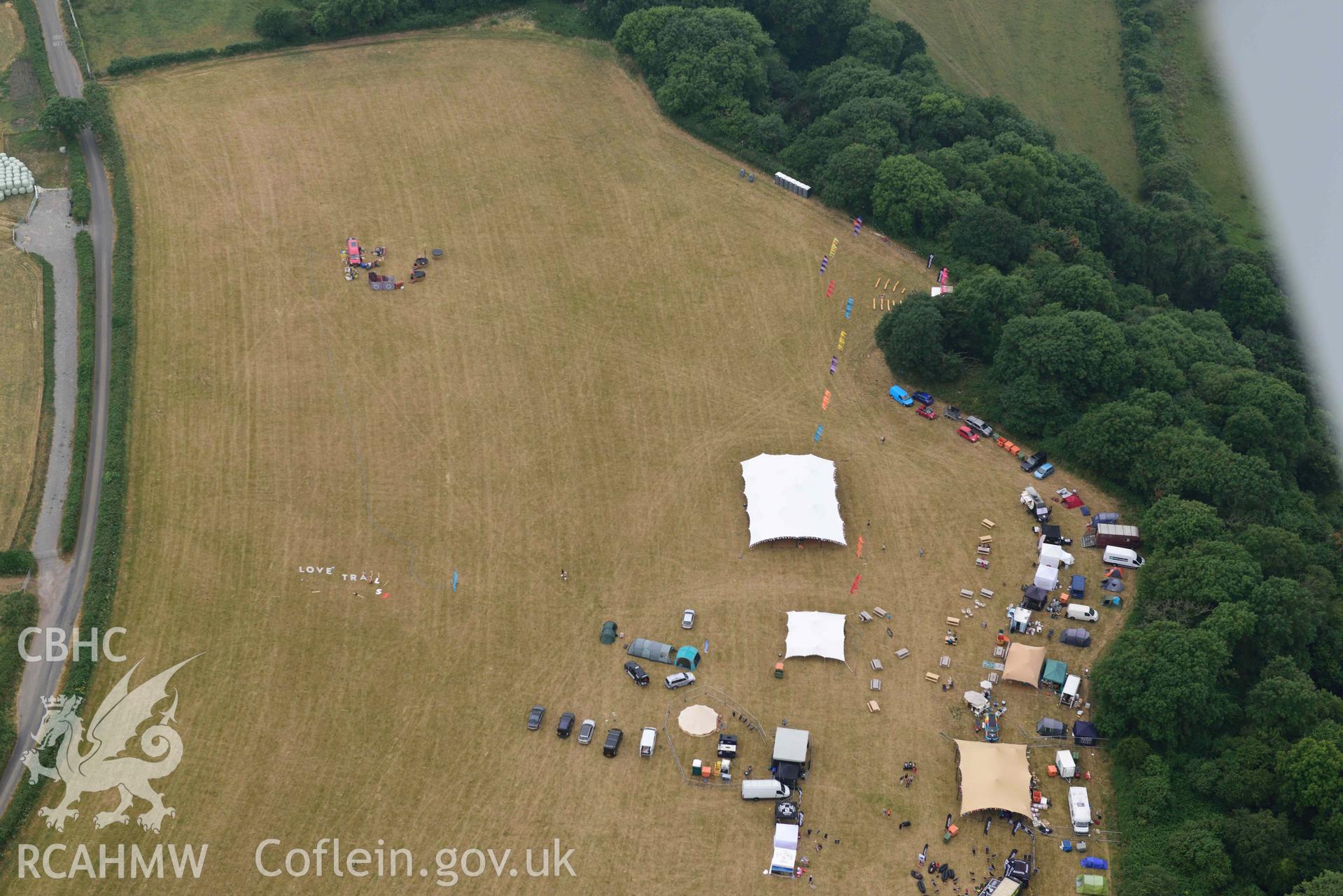 Aerial photography of Folk Camps at Weobley castle Aerial reconnaissance survey for the CHERISH Project. Crown Copyright: CHERISH PROJECT 2018. Produced with EU funds through the Ireland Wales Co-operation Programme 2014-2020. All material made freely available through the Open Government Licence.