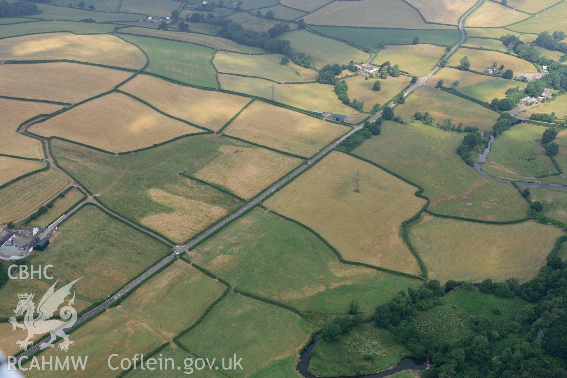 Aerial photography of Roman Road, 60 Carmarthan to Kidwelly at Pontmorlais cottage Aerial reconnaissance survey for the CHERISH Project. Crown Copyright: CHERISH PROJECT 2018. Produced with EU funds through the Ireland Wales Co-operation Programme 2014-2020. All material made freely available through the Open Government Licence.