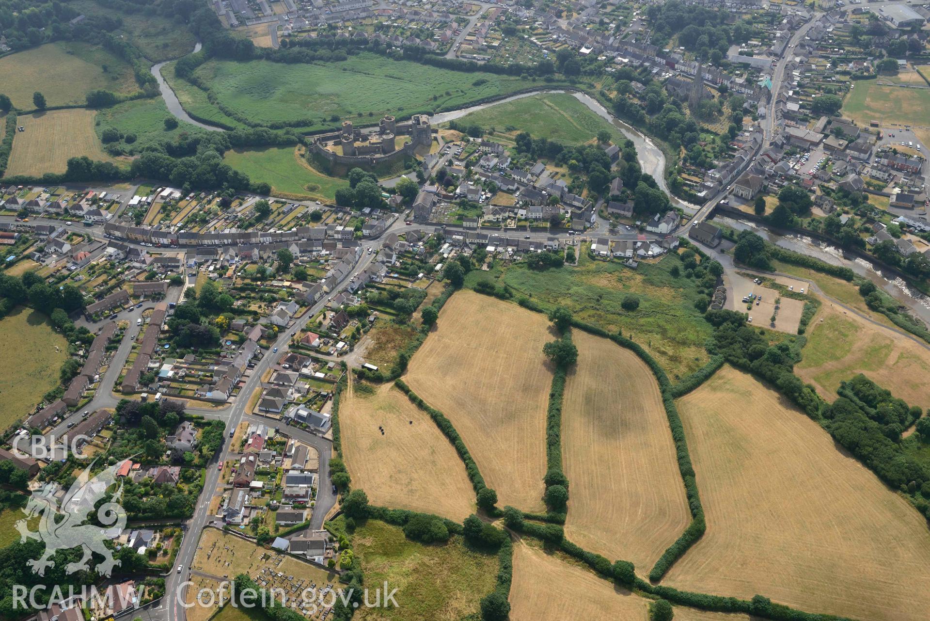 Aerial photography of Kidwell Town & borough with parchmarks in grassland Aerial reconnaissance survey for the CHERISH Project. Crown Copyright: CHERISH PROJECT 2018. Produced with EU funds through the Ireland Wales Co-operation Programme 2014-2020. All material made freely available through the Open Government Licence.