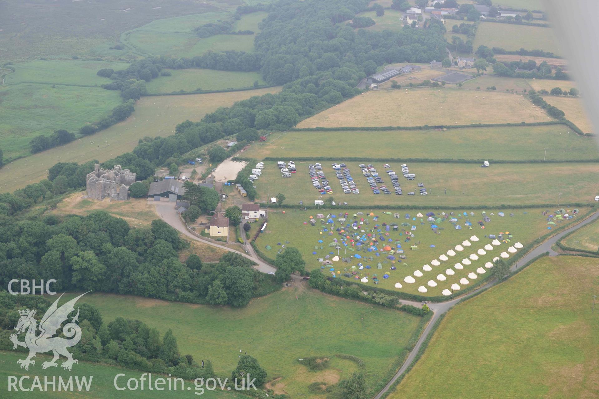 Aerial photography of Folk Camps at Weobley castle Aerial reconnaissance survey for the CHERISH Project. Crown Copyright: CHERISH PROJECT 2018. Produced with EU funds through the Ireland Wales Co-operation Programme 2014-2020. All material made freely available through the Open Government Licence.