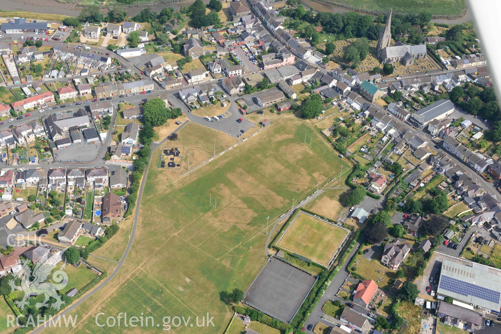 Aerial photography of Kidwell Town & borough with parchmarks in grassland Aerial reconnaissance survey for the CHERISH Project. Crown Copyright: CHERISH PROJECT 2018. Produced with EU funds through the Ireland Wales Co-operation Programme 2014-2020. All material made freely available through the Open Government Licence.