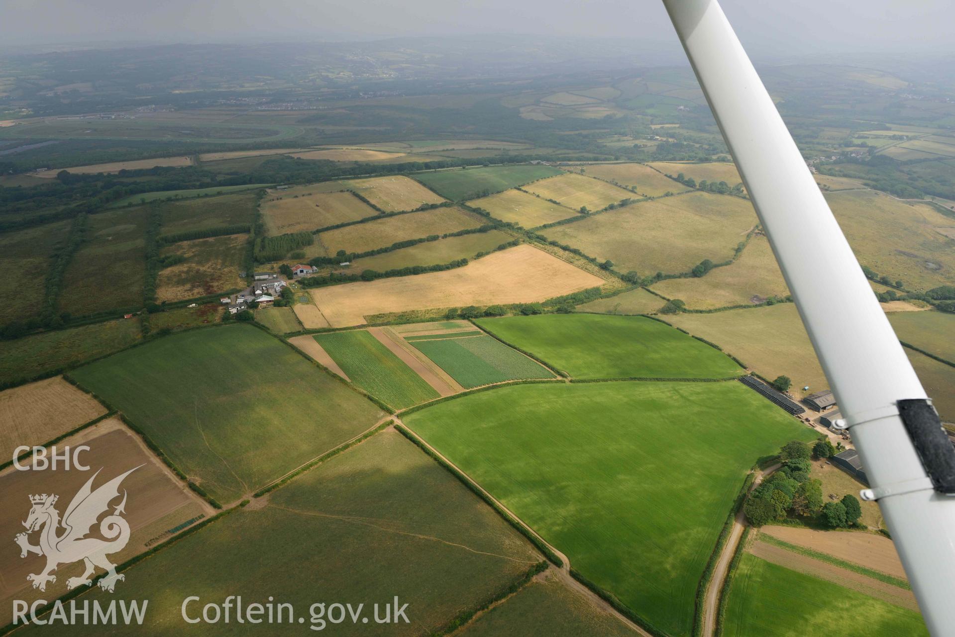 Aerial photography of Parc Wilis defended enclosure Aerial reconnaissance survey for the CHERISH Project. Crown Copyright: CHERISH PROJECT 2018. Produced with EU funds through the Ireland Wales Co-operation Programme 2014-2020. All material made freely available through the Open Government Licence.