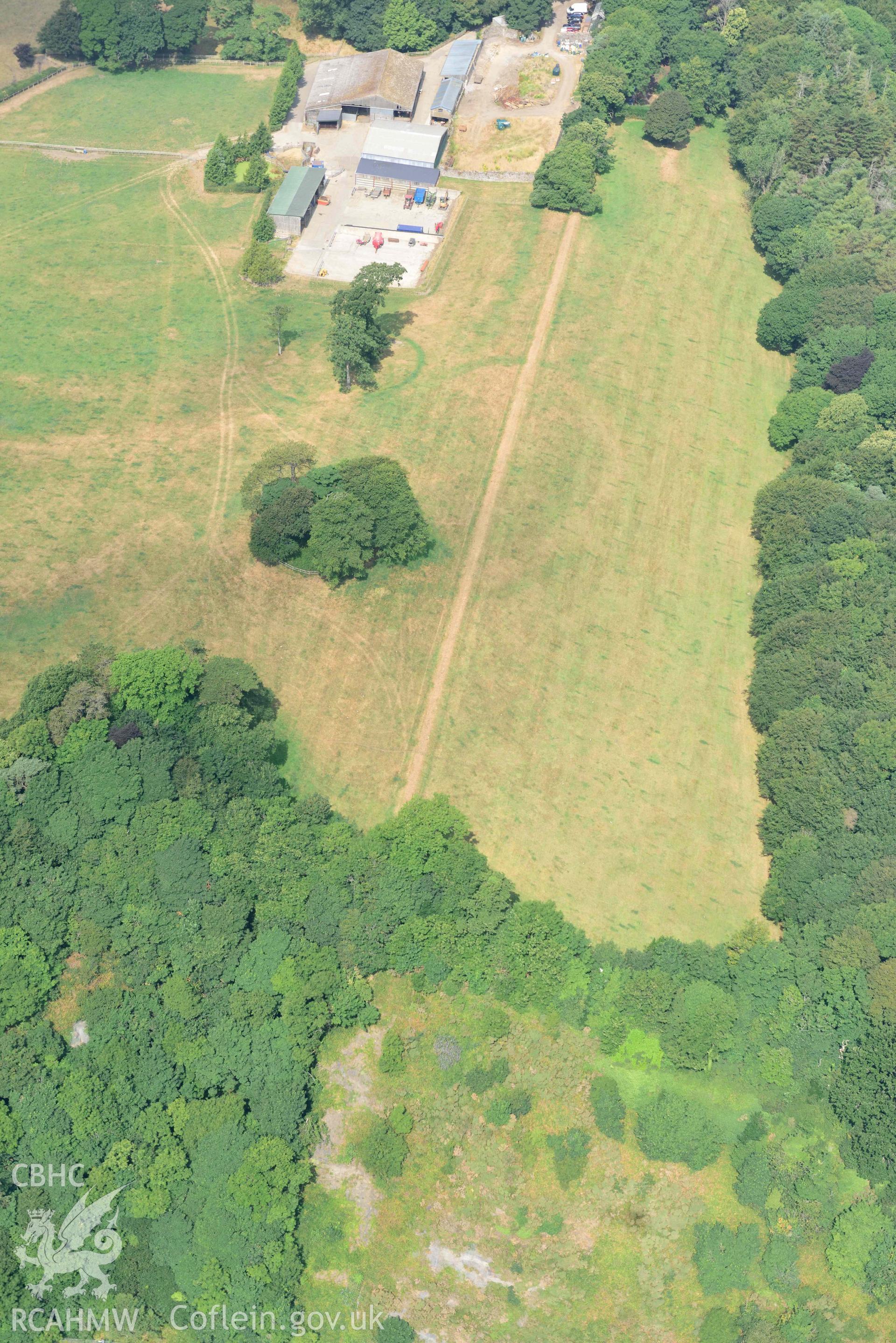 Aerial photography of Hean Castle defended enclosure Aerial reconnaissance survey for the CHERISH Project. Crown Copyright: CHERISH PROJECT 2018. Produced with EU funds through the Ireland Wales Co-operation Programme 2014-2020. All material made freely available through the Open Government Licence.