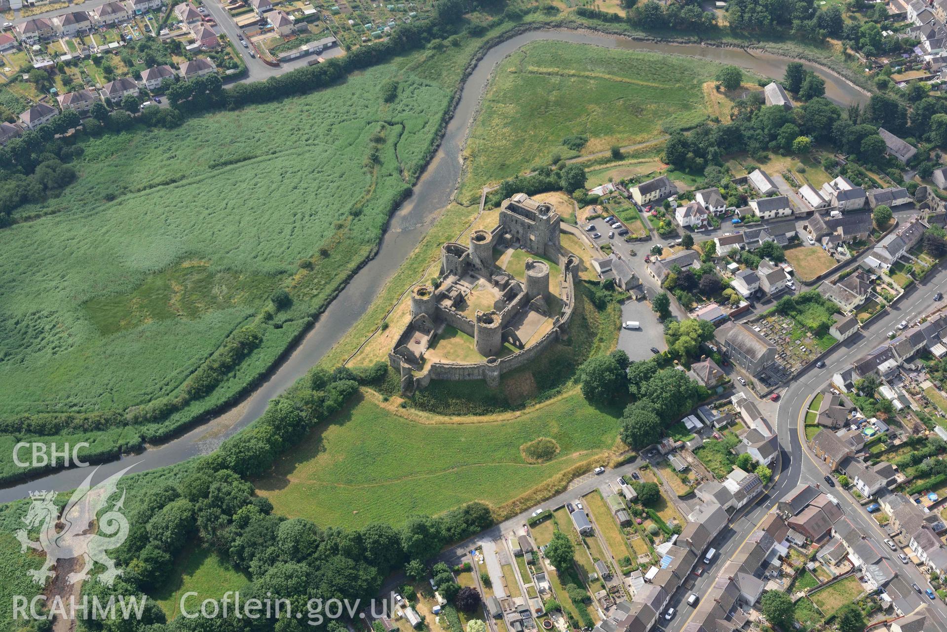 Aerial photography of Kidwelly Castle Aerial reconnaissance survey for the CHERISH Project. Crown Copyright: CHERISH PROJECT 2018. Produced with EU funds through the Ireland Wales Co-operation Programme 2014-2020. All material made freely available through the Open Government Licence.