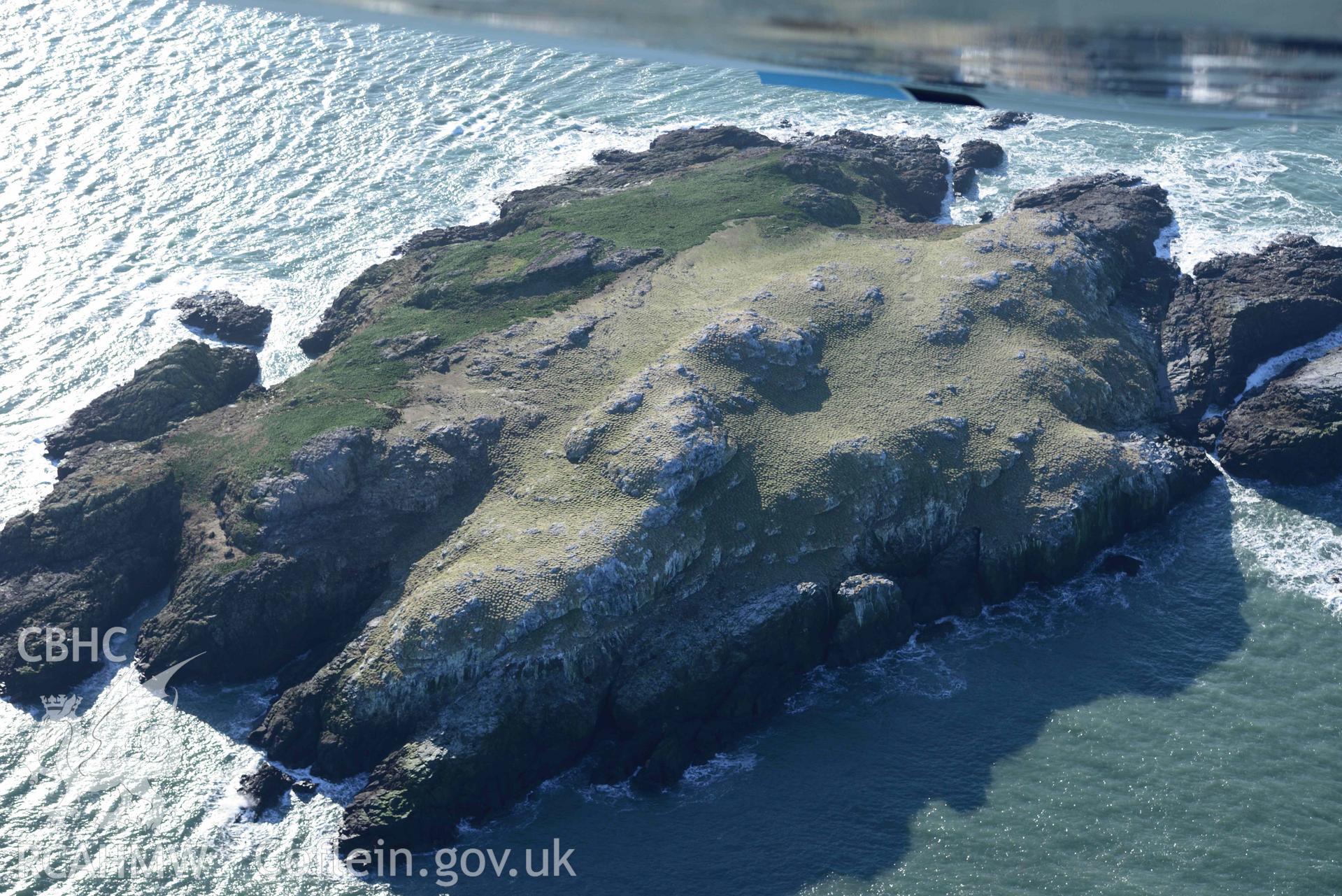 Aerial photo of  Grassholm Island.  Aerial reconnaissance survey for the CHERISH Project. Crown Copyright: CHERISH PROJECT 2018. Produced with EU funds through the Ireland Wales Co-operation Programme 2014-2020. All material made freely available through the Open Government Licence.