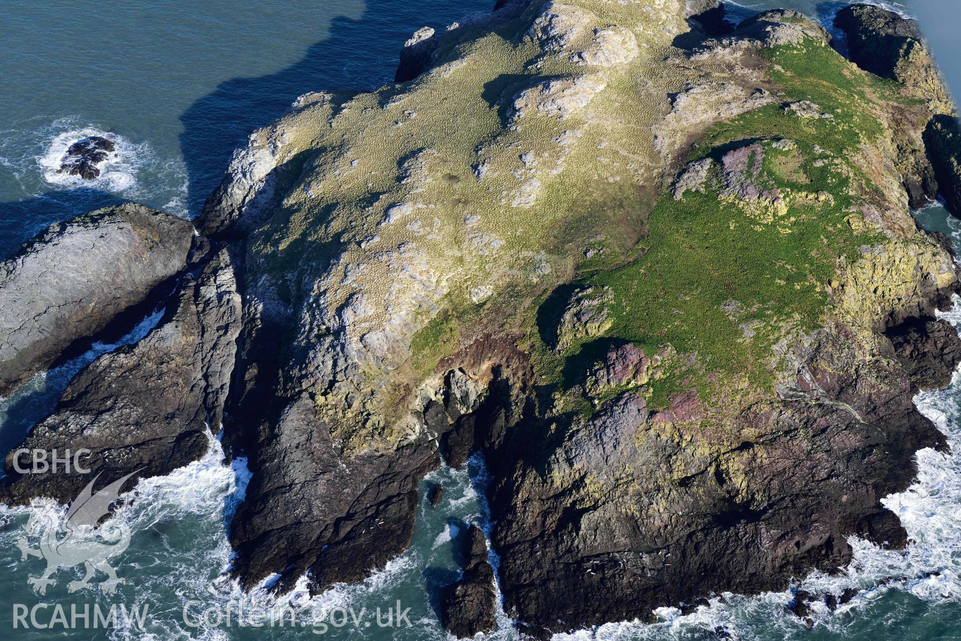 Aerial photo of  Grassholm Island.  Aerial reconnaissance survey for the CHERISH Project. Crown Copyright: CHERISH PROJECT 2018. Produced with EU funds through the Ireland Wales Co-operation Programme 2014-2020. All material made freely available through the Open Government Licence.