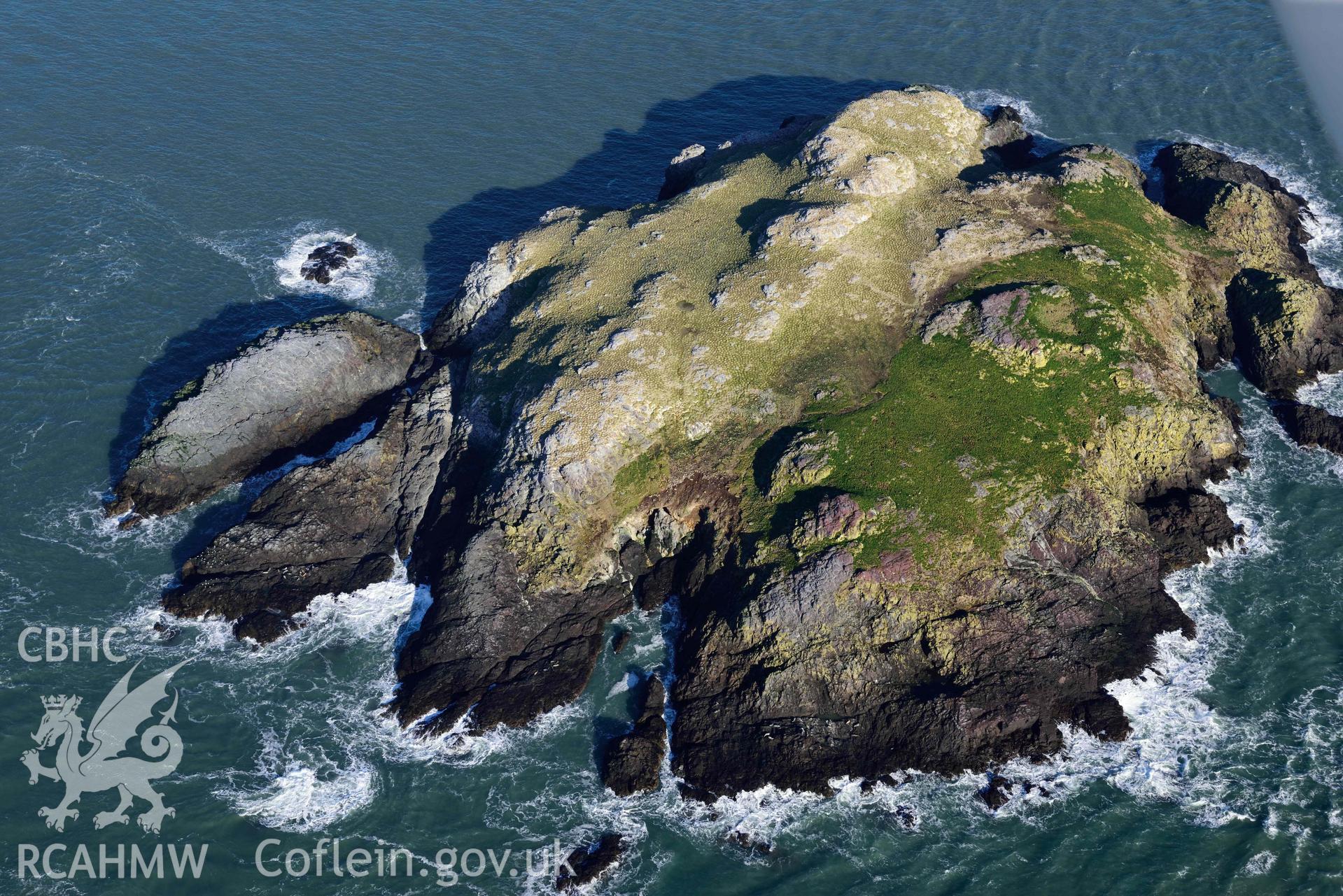 Aerial photo of  Grassholm Island.  Aerial reconnaissance survey for the CHERISH Project. Crown Copyright: CHERISH PROJECT 2018. Produced with EU funds through the Ireland Wales Co-operation Programme 2014-2020. All material made freely available through the Open Government Licence.