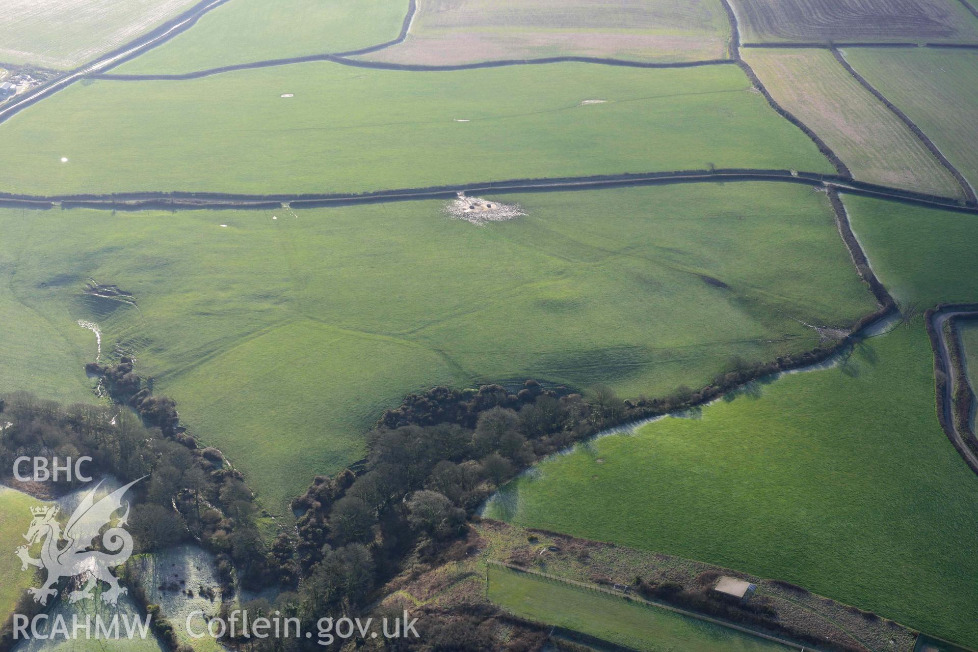 Aerial photo of Walton west mound.  Aerial reconnaissance survey for the CHERISH Project. Crown Copyright: CHERISH PROJECT 2018. Produced with EU funds through the Ireland Wales Co-operation Programme 2014-2020. All material made freely available through the Open Government Licence.