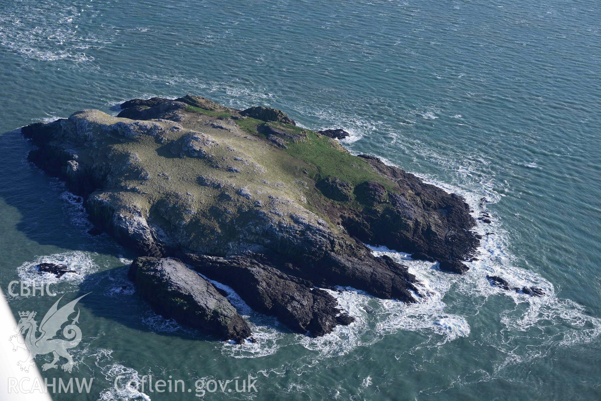 Aerial photo of  Grassholm Island.  Aerial reconnaissance survey for the CHERISH Project. Crown Copyright: CHERISH PROJECT 2018. Produced with EU funds through the Ireland Wales Co-operation Programme 2014-2020. All material made freely available through the Open Government Licence.