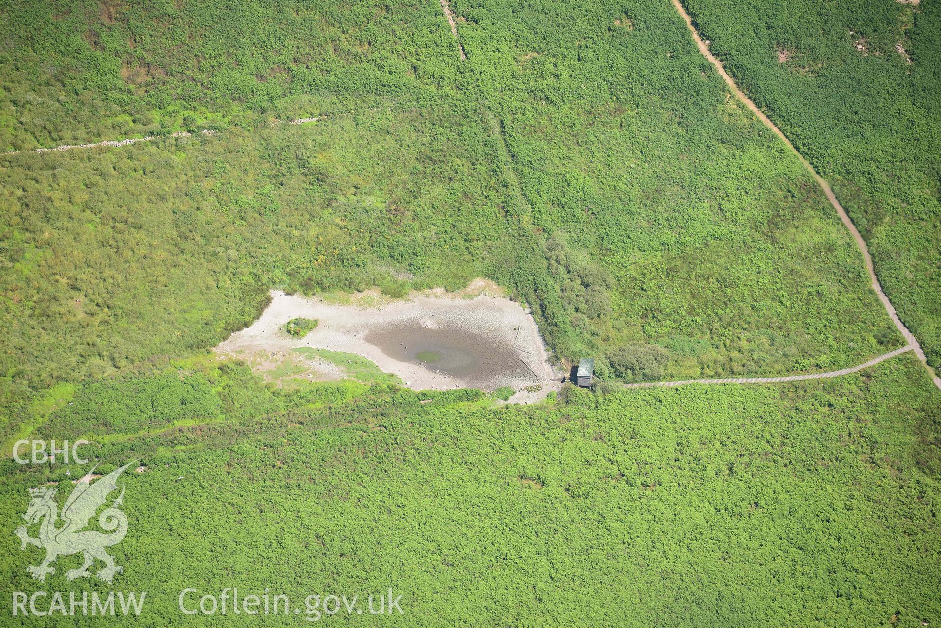 Aerial photography of Skomer Island: lynchet near south stream settlement in drought Aerial reconnaissance survey for the CHERISH Project. Crown Copyright: CHERISH PROJECT 2018. Produced with EU funds through the Ireland Wales Co-operation Programme 2014-2020. All material made freely available through the Open Government Licence.