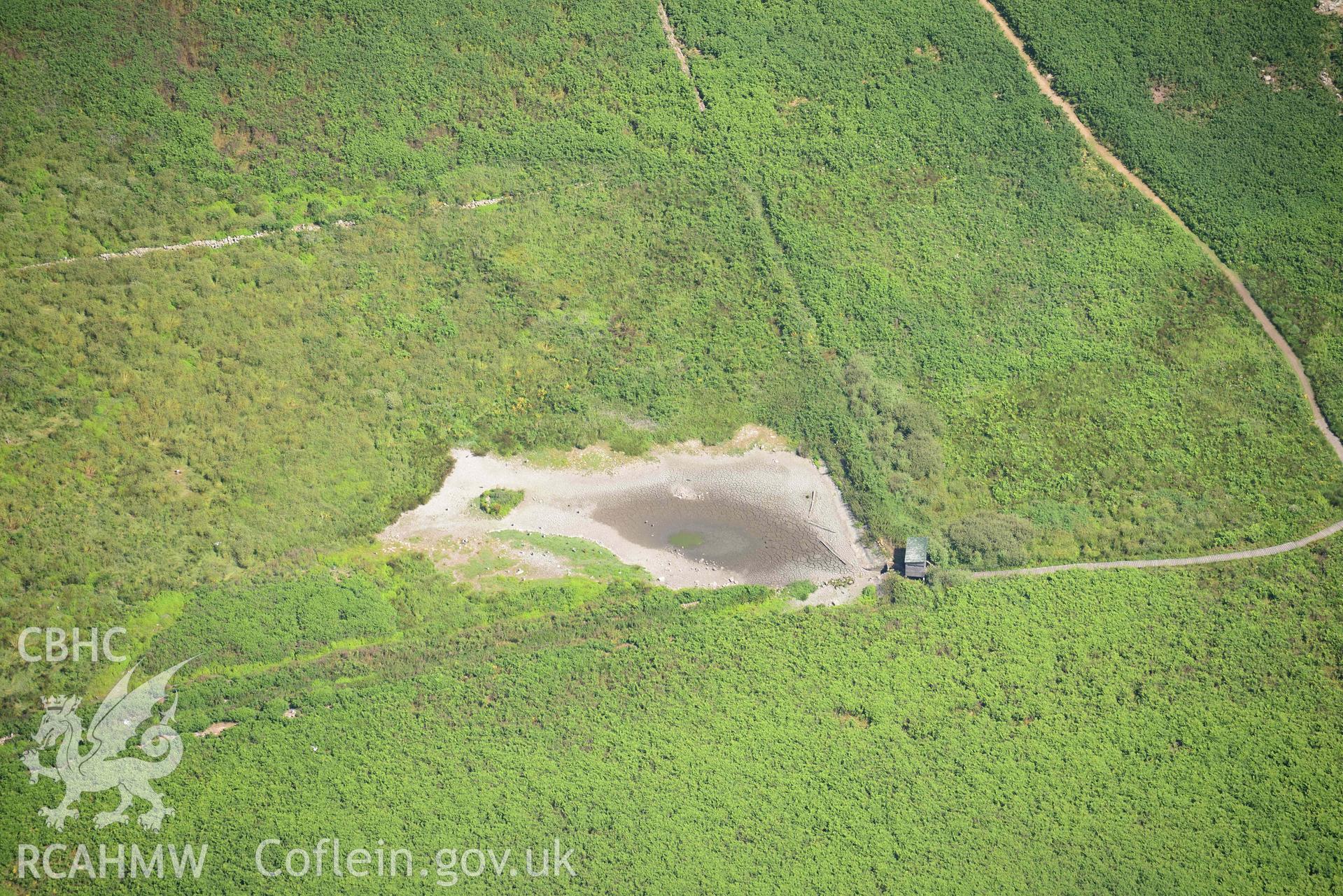 Aerial photography of Skomer Island: lynchet near south stream settlement in drought Aerial reconnaissance survey for the CHERISH Project. Crown Copyright: CHERISH PROJECT 2018. Produced with EU funds through the Ireland Wales Co-operation Programme 2014-2020. All material made freely available through the Open Government Licence.