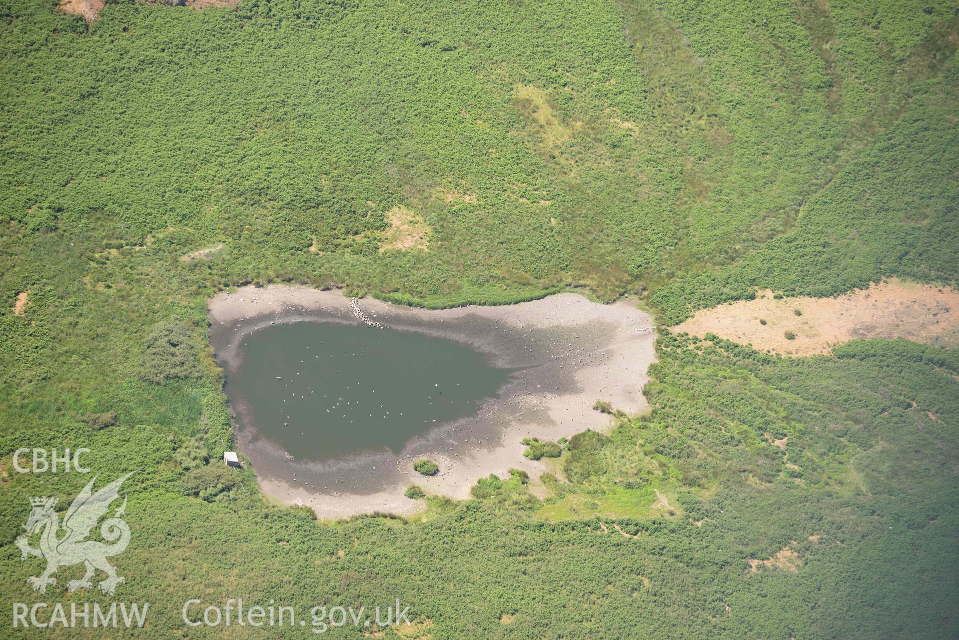 Aerial photography of Skomer Island: north pond Aerial reconnaissance survey for the CHERISH Project. Crown Copyright: CHERISH PROJECT 2018. Produced with EU funds through the Ireland Wales Co-operation Programme 2014-2020. All material made freely available through the Open Government Licence.