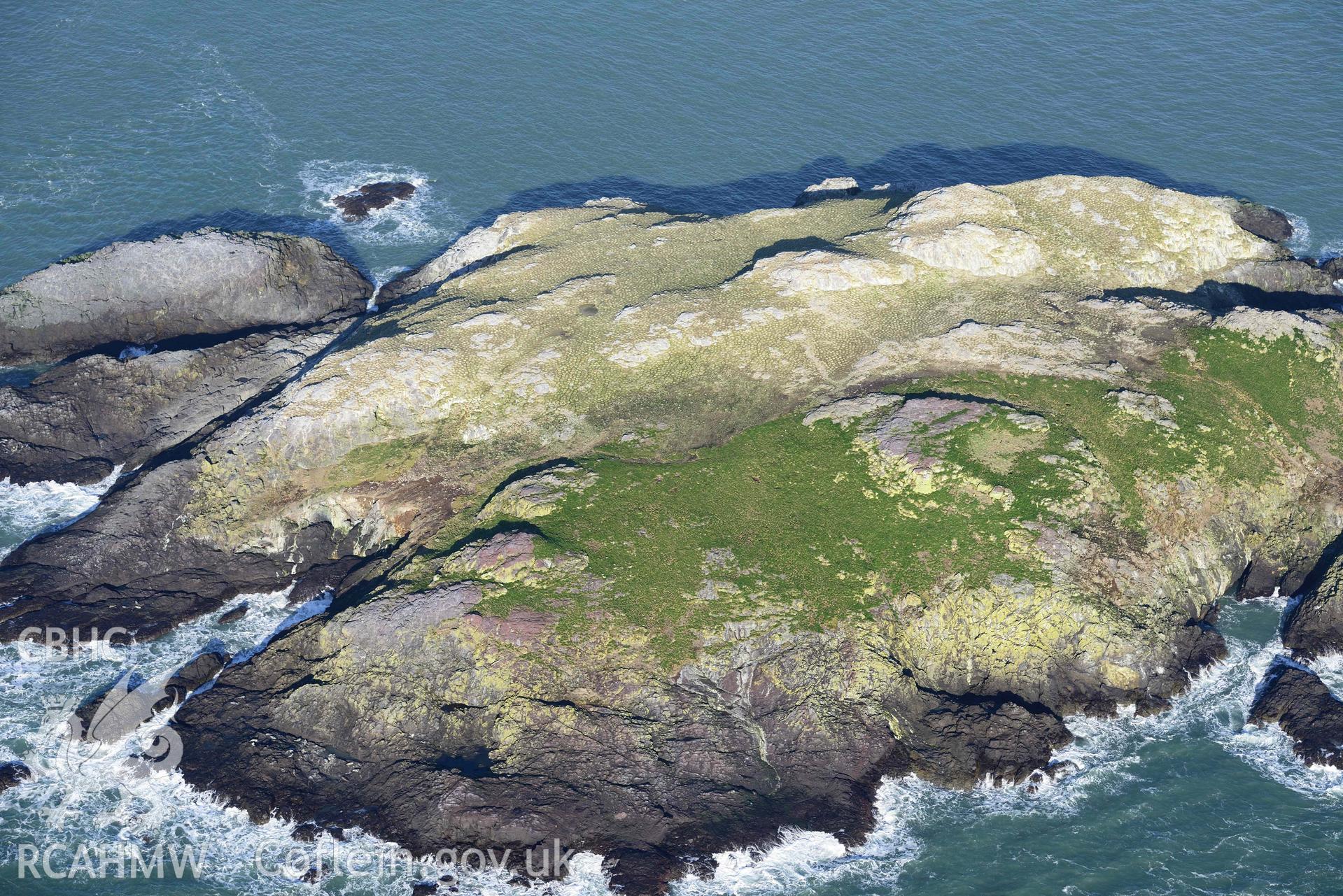 Aerial photo of  Grassholm Island.  Aerial reconnaissance survey for the CHERISH Project. Crown Copyright: CHERISH PROJECT 2018. Produced with EU funds through the Ireland Wales Co-operation Programme 2014-2020. All material made freely available through the Open Government Licence.