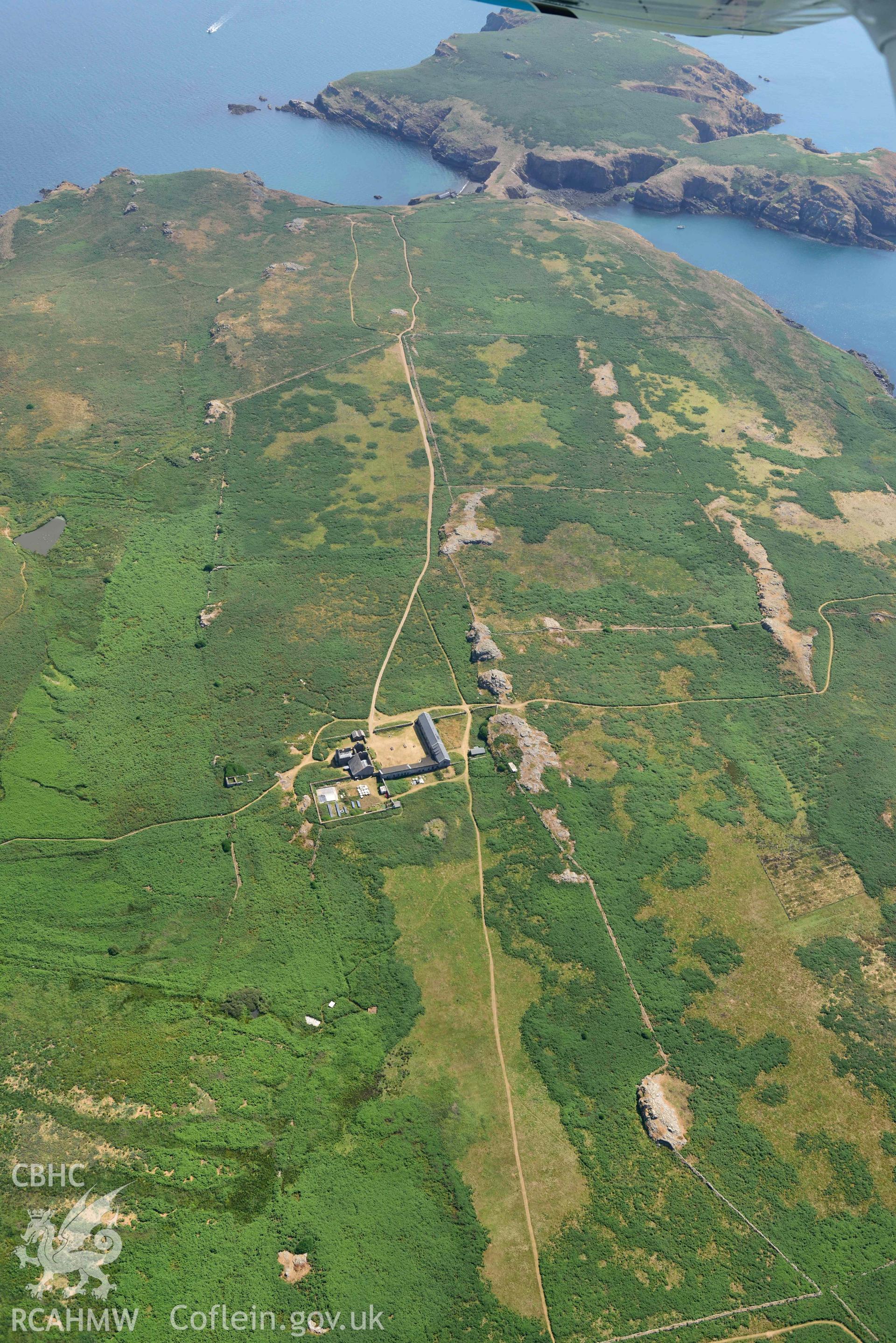 Aerial photography of Old Farm Skomer, Skomer Island Aerial reconnaissance survey for the CHERISH Project. Crown Copyright: CHERISH PROJECT 2018. Produced with EU funds through the Ireland Wales Co-operation Programme 2014-2020. All material made freely available through the Open Government Licence.