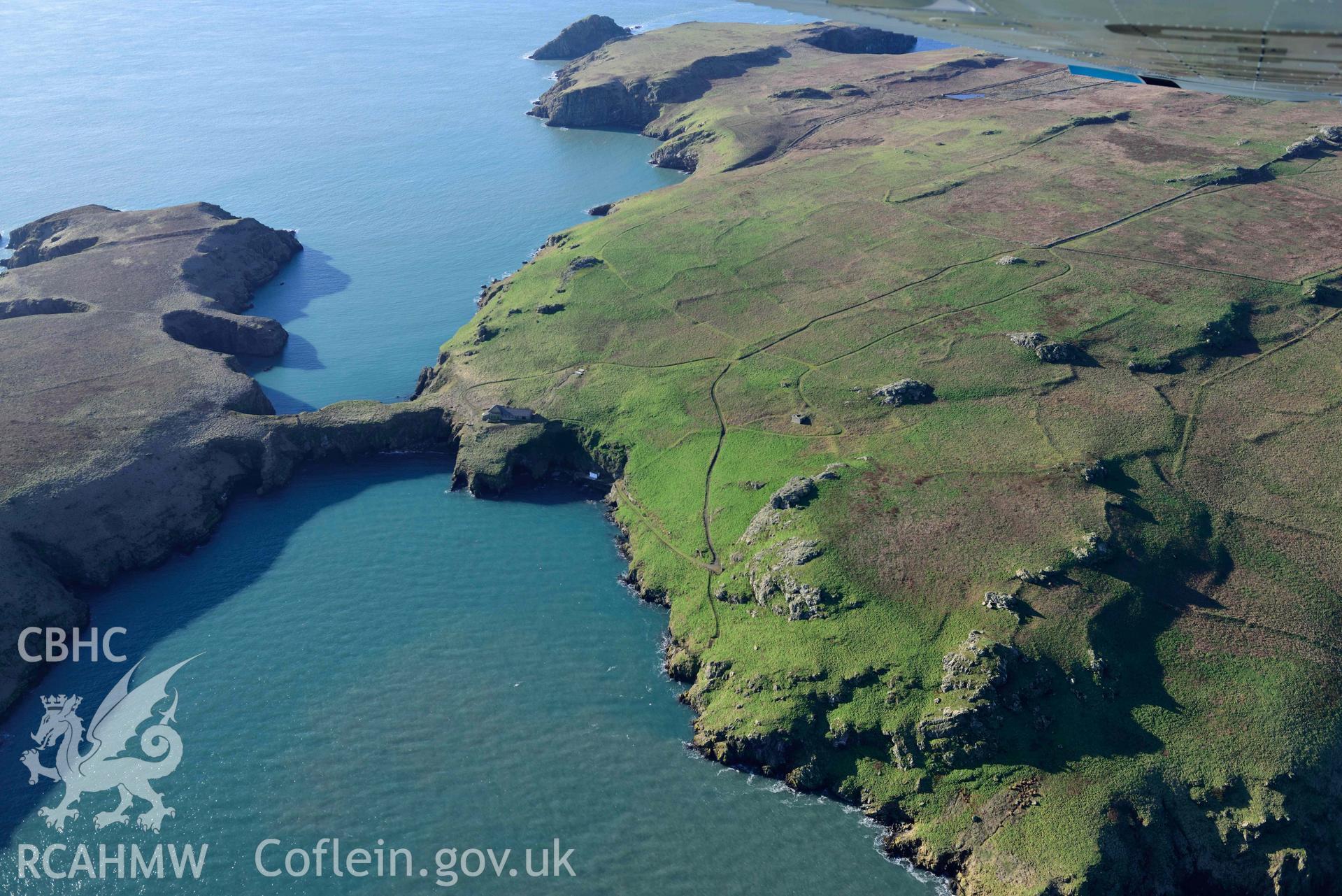 Aerial photo of Skomer Neck.  Aerial reconnaissance survey for the CHERISH Project. Crown Copyright: CHERISH PROJECT 2018. Produced with EU funds through the Ireland Wales Co-operation Programme 2014-2020. All material made freely available through the Open Government Licence.