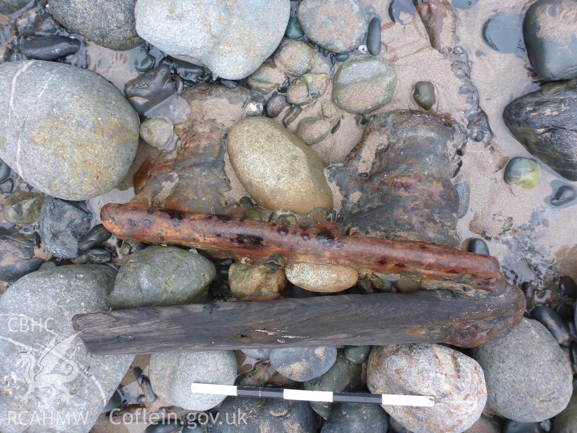 Deck bollard and associated timber, from the wreck of the NIDELV on Musselwick Sands, on 13/01/2025. Scale is 0.5m.