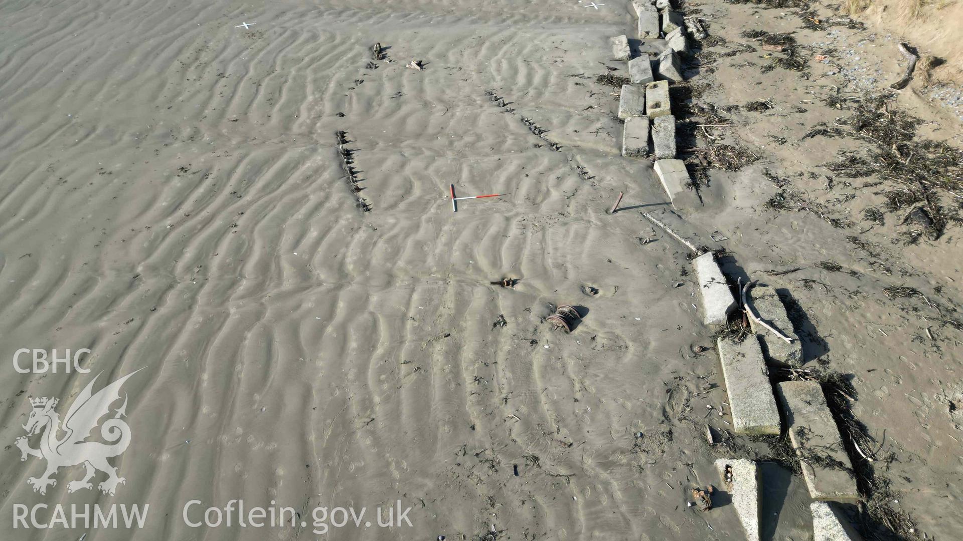 Oblique view of the wreck of the FRANCIS BEDDOE, looking west on 31/01/2025. Scales are 1m.
