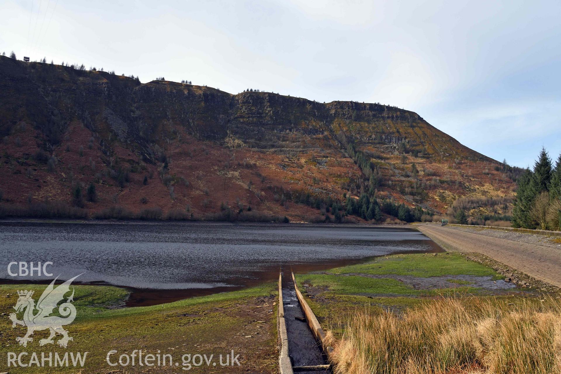 Lake, now reservoir, and modern dam looking west