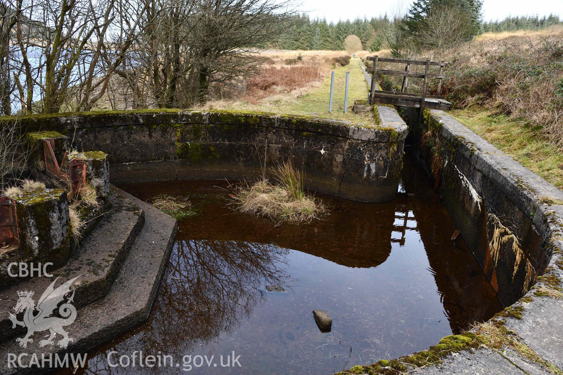 Sluice and drain at SN 9193 0333 on east side of reservoir, looking north