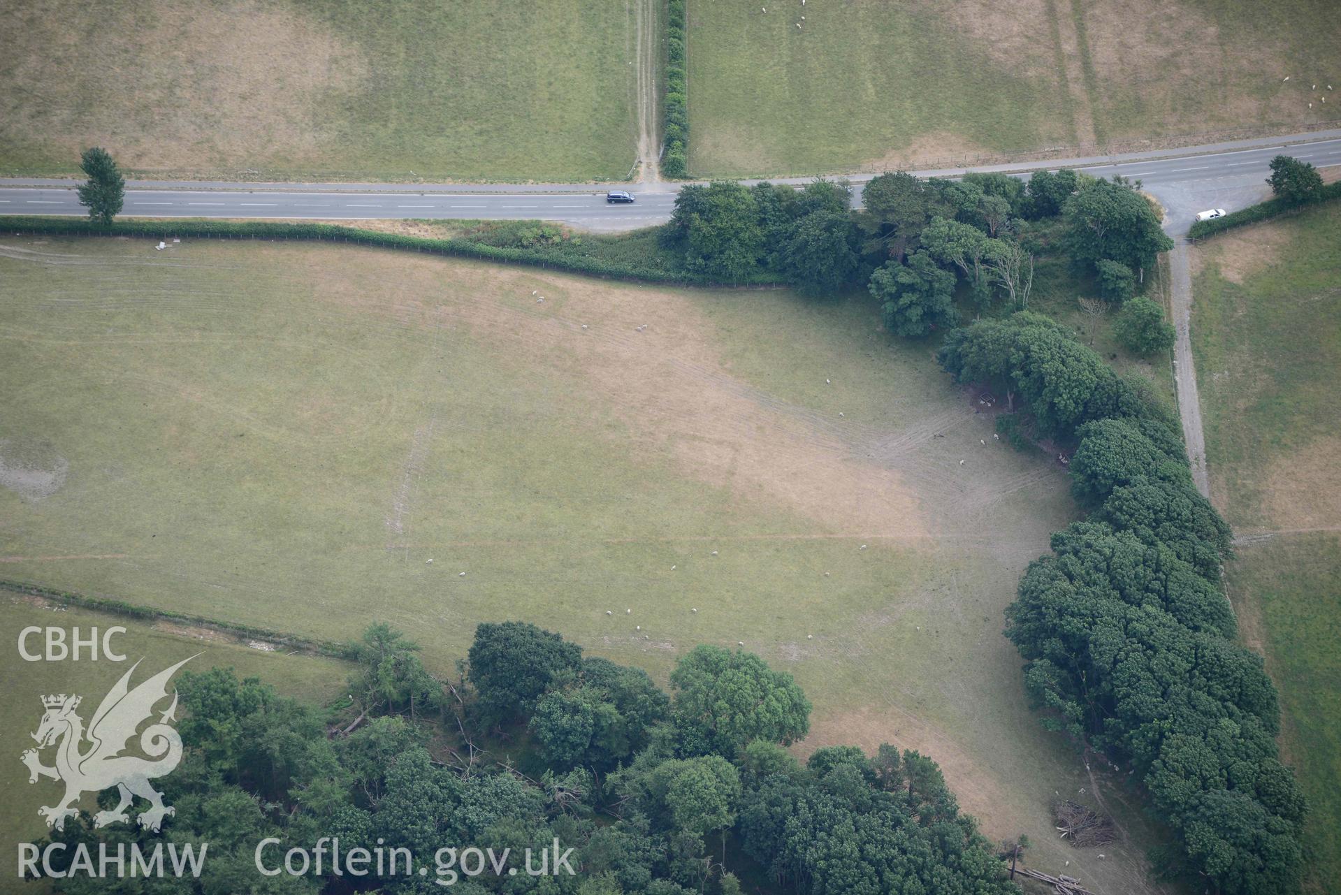 Aerial photograph: Croes Faen, cropmarks of square barrow cemetery. Crown: CHERISH PROJECT 2018. Produced with EU funds through the Ireland Wales Co-operation Programme 2014-2020 (NGR SH598018)