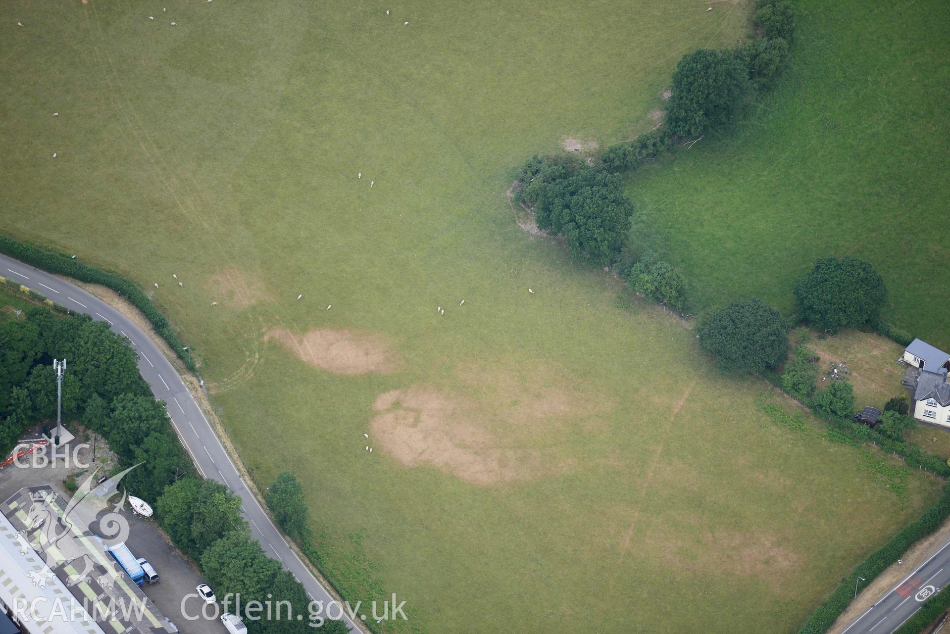 Aerial photograph: Bryncrug, Pont y Felindre, square barrow cemetery. Crown: CHERISH PROJECT 2018. Produced with EU funds through the Ireland Wales Co-operation Programme 2014-2020 (NGR SH613032)