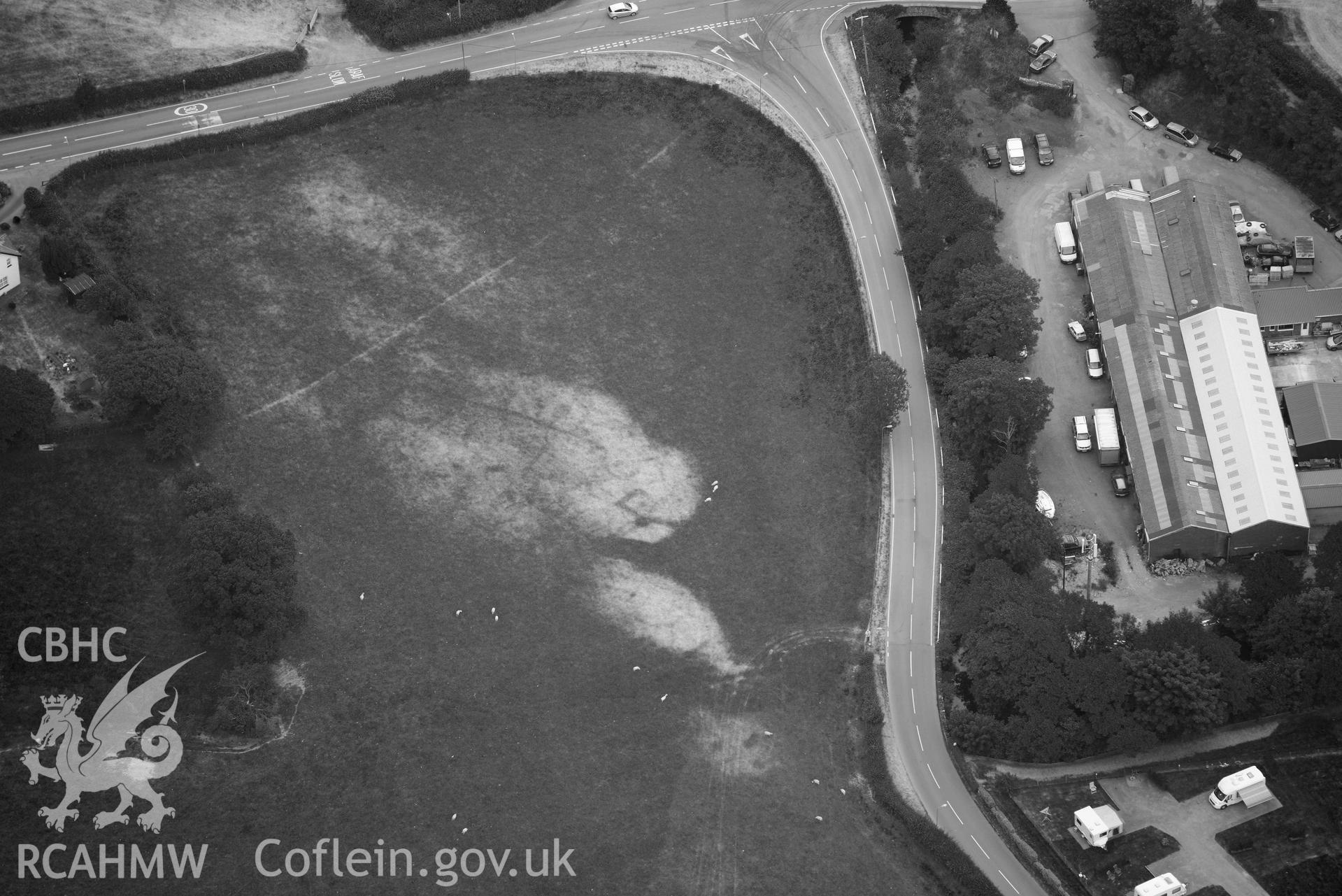 Aerial photograph: Bryncrug, Pont y Felindre, square barrow cemetery. Crown: CHERISH PROJECT 2018. Produced with EU funds through the Ireland Wales Co-operation Programme 2014-2020 (NGR SH613032)