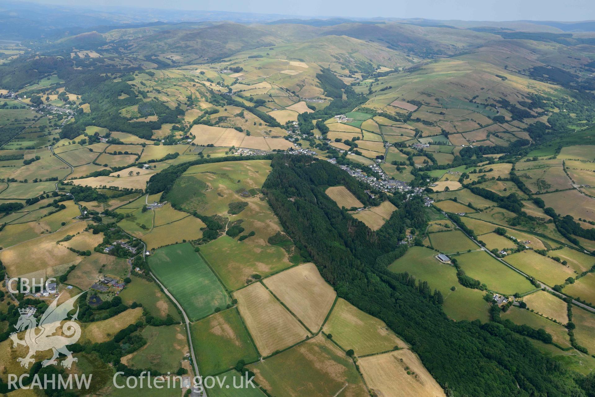 Aerial photograph: Talybont village, high summer view looking over Banc Ty Hen from the west. Crown: CHERISH PROJECT 2018. Produced with EU funds through the Ireland Wales Co-operation Programme 2014-2020 (NGR SN654892)