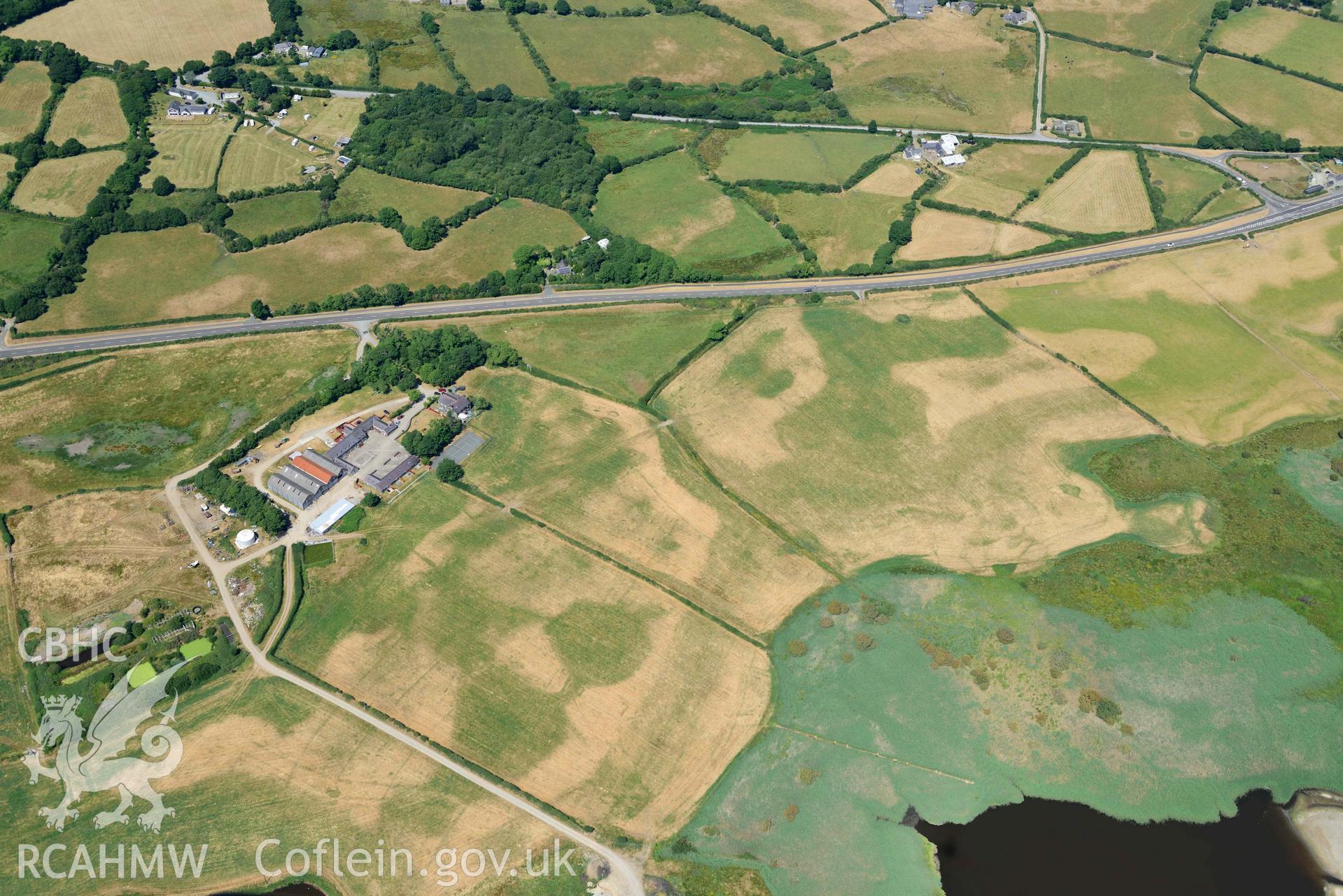 Aerial photograph: Hen-Efail cropmark enclosure. Crown: CHERISH PROJECT 2018. Produced with EU funds through the Ireland Wales Co-operation Programme 2014-2020 (NGR SH449377)