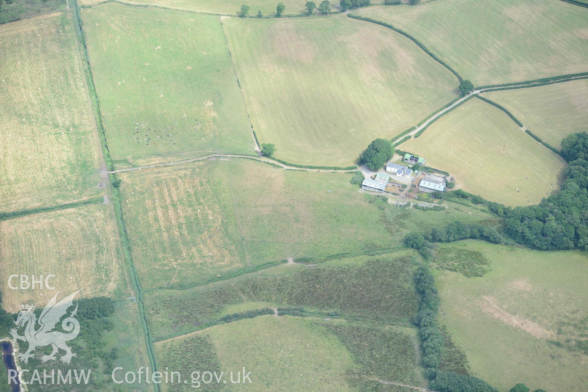 Aerial photograph: Ynyscapel defended enclosure. Crown: CHERISH PROJECT 2018. Produced with EU funds through the Ireland Wales Co-operation Programme 2014-2020 (NGR SN643905)