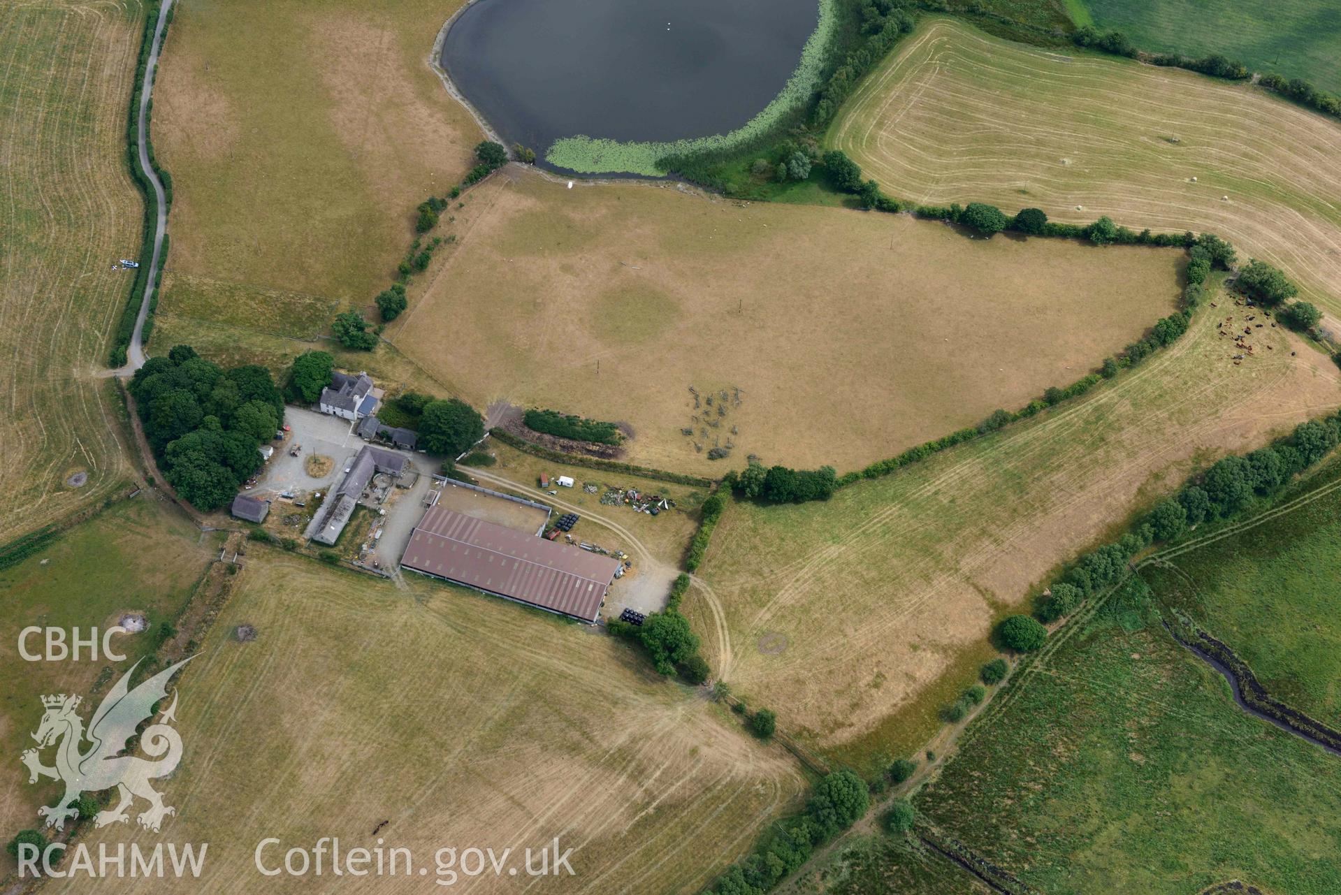 Aerial photograph: Maes-Llyn, cropmarks of enclosures and ditches. Crown: CHERISH PROJECT 2018. Produced with EU funds through the Ireland Wales Co-operation Programme 2014-2020 (NGR SN692629)