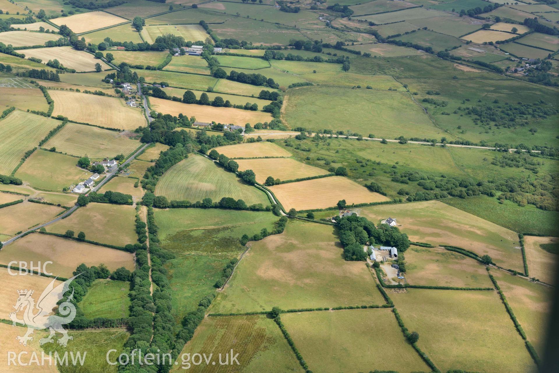 Aerial photograph: Maesbanadlog rectangular enclosure, cropmark. Crown: CHERISH PROJECT 2018. Produced with EU funds through the Ireland Wales Co-operation Programme 2014-2020 (NGR SN705671)